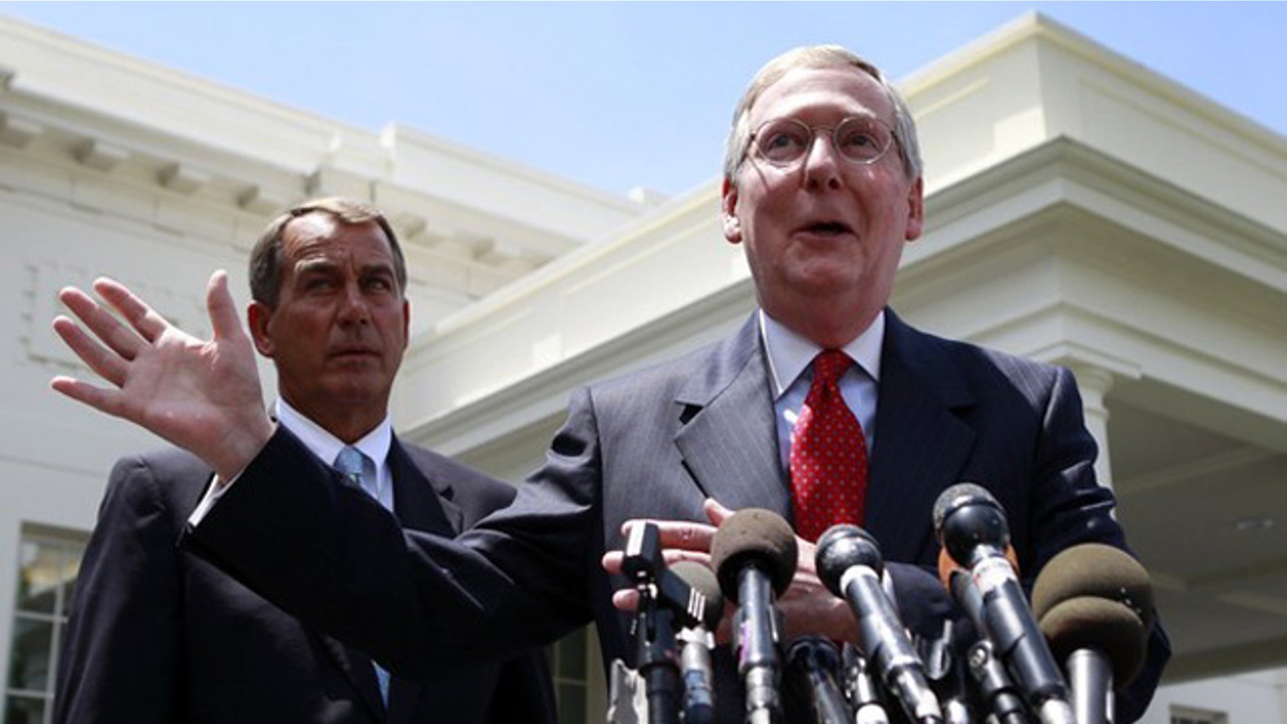 Senate Minority Leader Mitch McConnell, right, and House Minority Leader John Boehner are shown outside the White House June 10. (Reuters Photo)