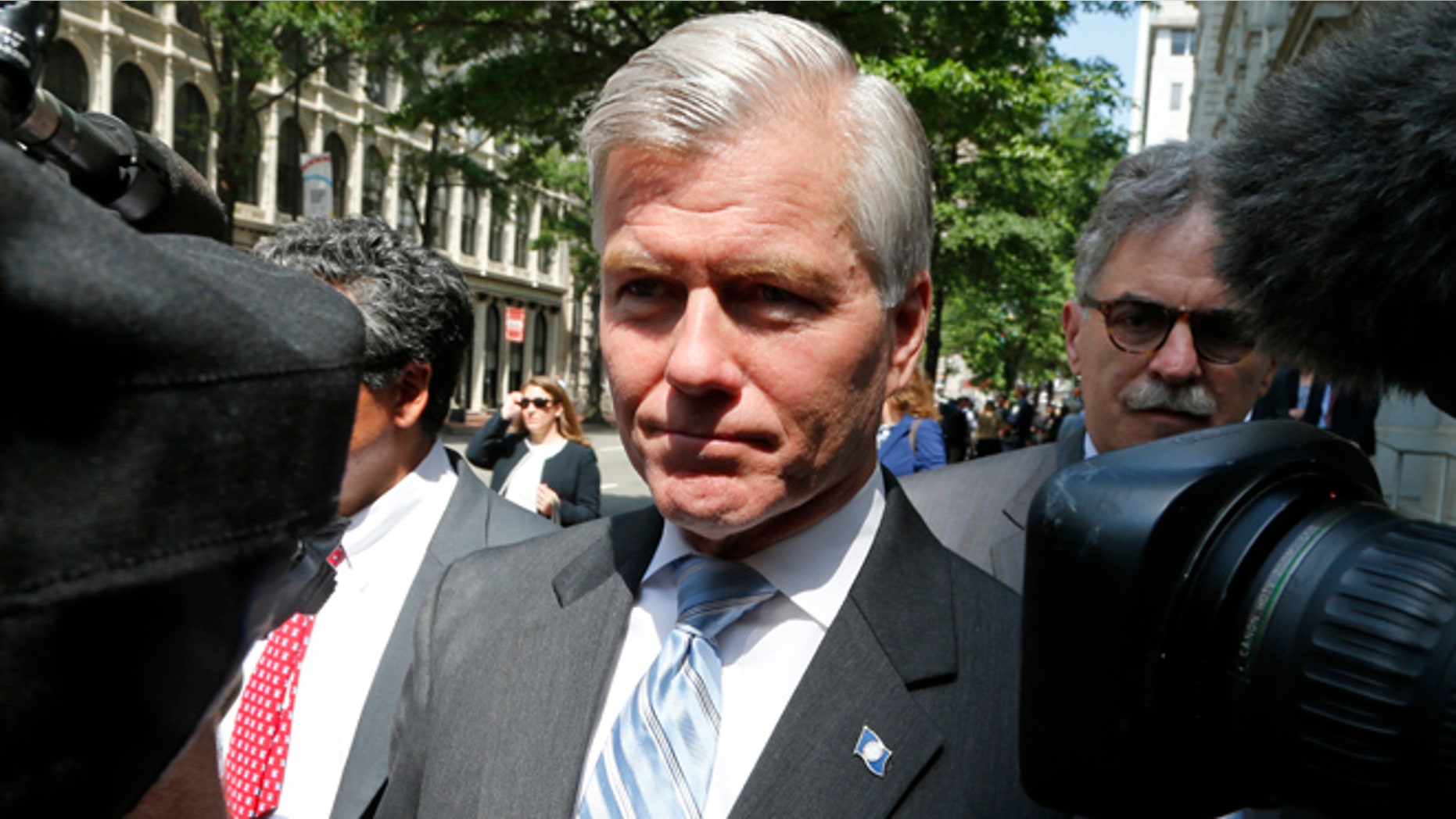 May 12, 2015: Former Virginia Gov. Bob McDonnell navigates a group of cameras as he leaves the 4th U.S. Circuit Court of Appeals after a hearing the appeal of his corruption conviction in Richmond, Va. (AP)