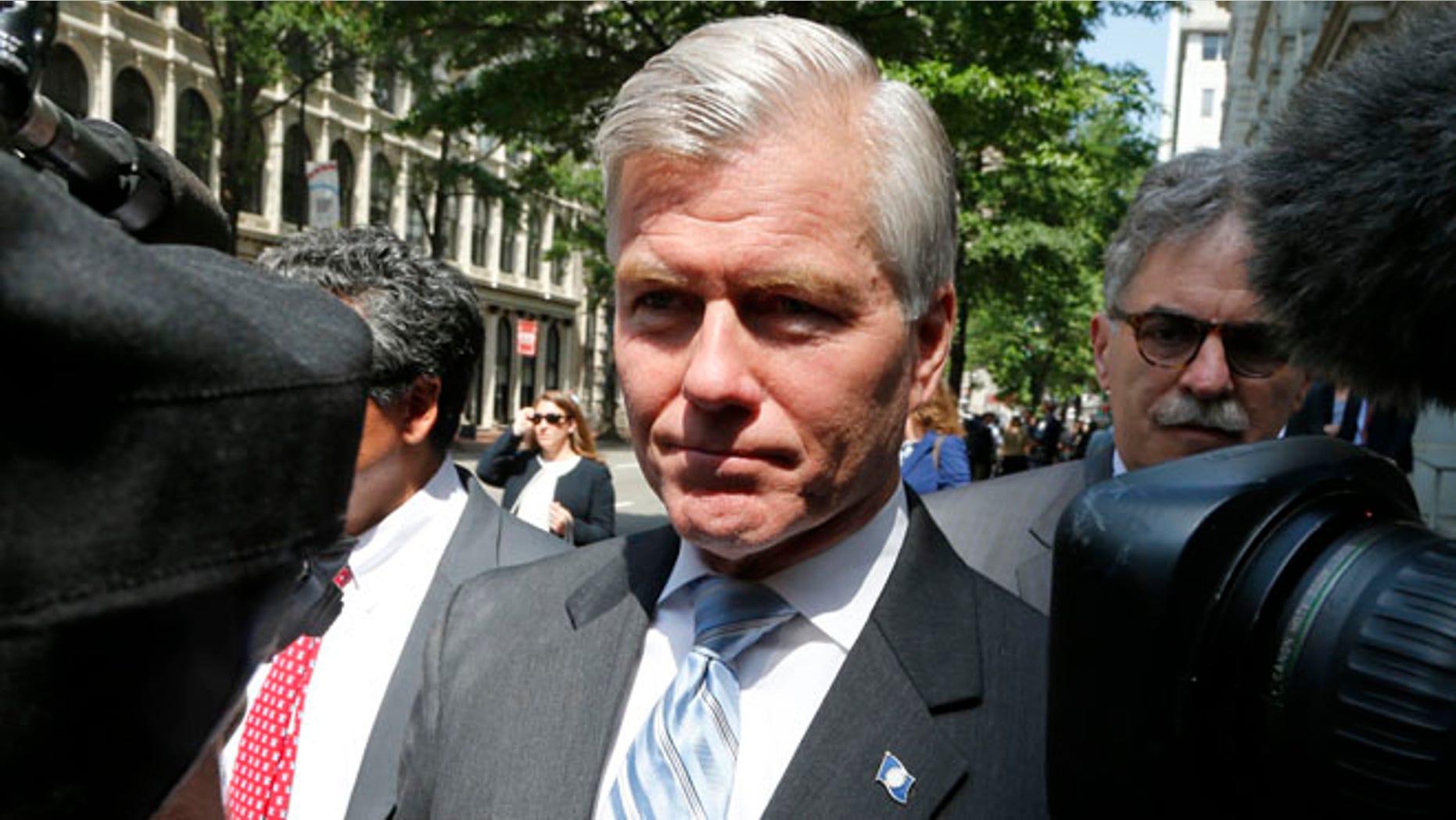 May 12, 2015: Former Virginia Gov. Bob McDonnell navigates a group of cameras as he leaves the 4th U.S. Circuit Court of Appeals after a hearing the appeal of his corruption conviction in Richmond, Va. (AP)