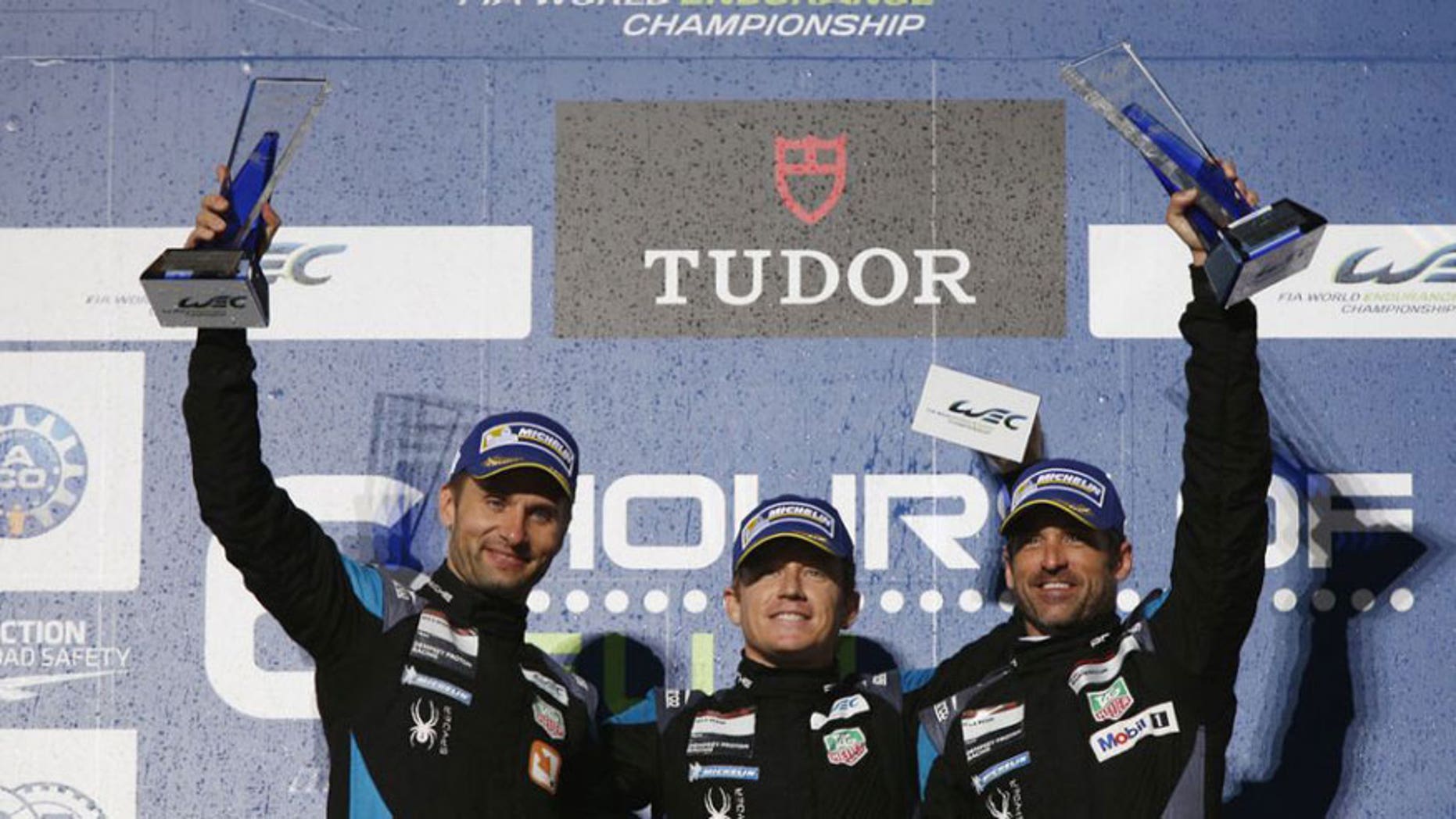 Dempsey Proton Racing drivers Marco Seefried, Patrick Long, and Patrick Dempsey.