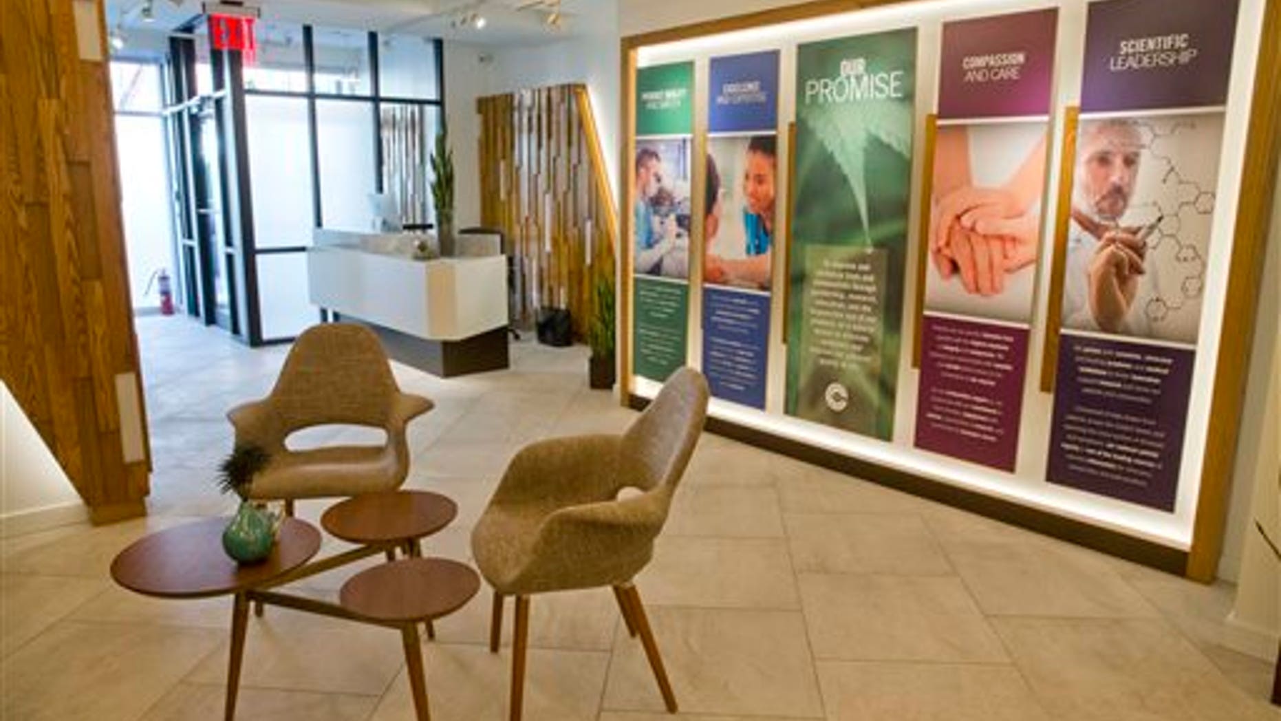 The reception area of Columbia Care, one of New York City's first medicinal marijuana dispensaries, is seen, Wednesday, Jan. 6, 2016, in New York. New Yorkers with cancer, AIDS, Parkinson's disease or other qualifying conditions will be able to obtain medical marijuana as early as Thursday, 18 months after lawmakers passed what is considered one of the strictest medical cannabis programs in the nation. (AP Photo/Mary Altaffer)