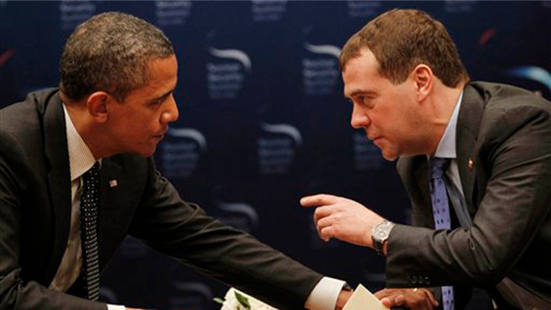March 26, 2012: President Obama chats with Russian President Dmitry Medvedev during a bilateral meeting at the Nuclear Security Summit in Seoul, South Korea.