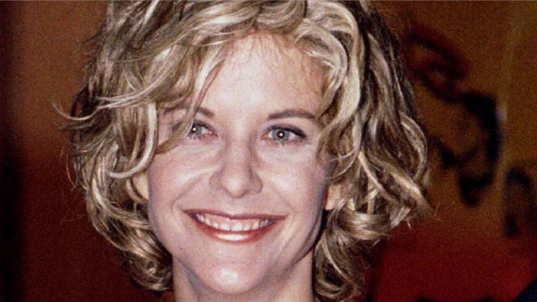 Meg Ryan, one of the stars of the new film "Courage Under Fire," poses at the film's premiere July 8. The film also stars Denzel-Washington. - RTXGMT1