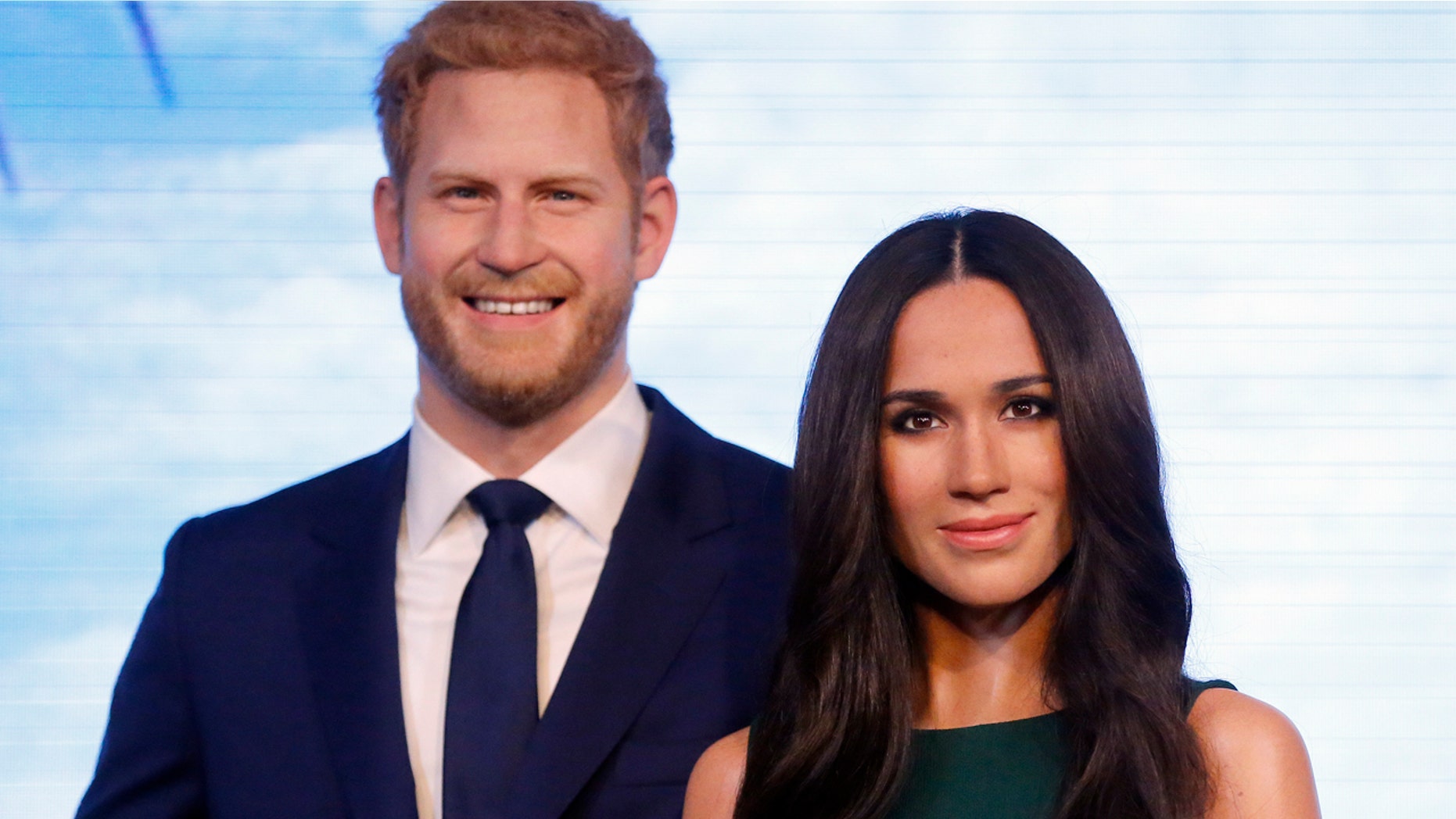 Britain's Prince Harry and his fiancee Meghan Markle are on display as wax figures at Madame Tussauds in London, Wednesday, May 9, 2018. As the world eyes are on the upcoming royal wedding, Madame Tussauds London unveils Meghan Markle's figure, standing alongside a re-styled figure of her groom, Prince Harry. (AP Photo/Frank Augstein)
