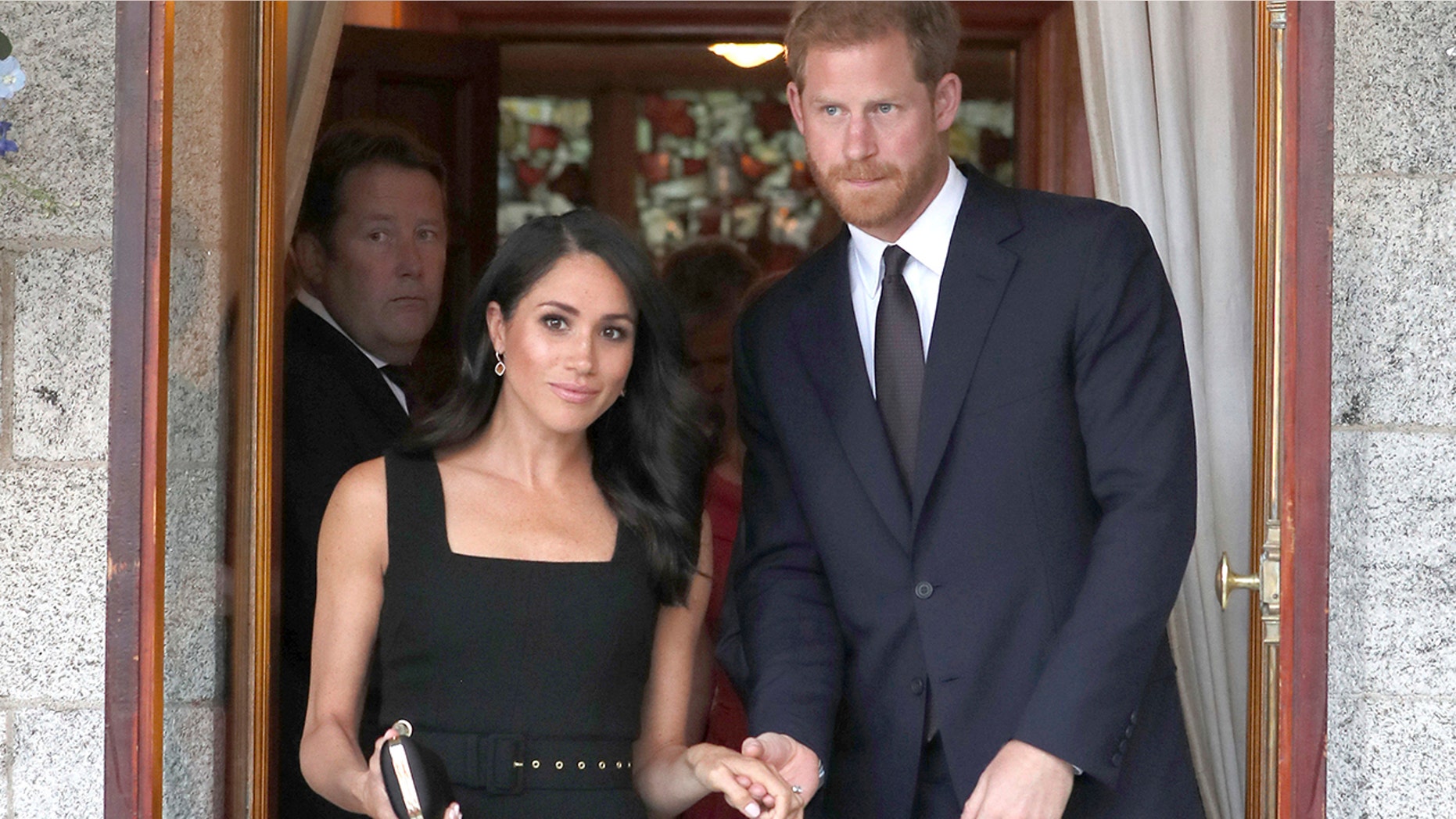 Britain's Prince Harry and Meghan Duchess of Sussex attend a Summer Party at the British Ambassador's residence in Dublin, Ireland, Tuesday July 10, 2018. The royal couple are on a two day visit to Ireland.