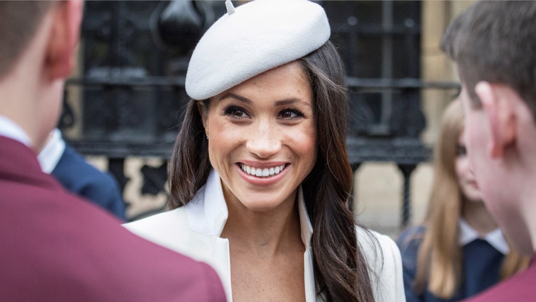 Britain's Prince Harry and his fiancee Meghan Markle meet school children in Dean's Yard in London, Britain March 12, 2018.