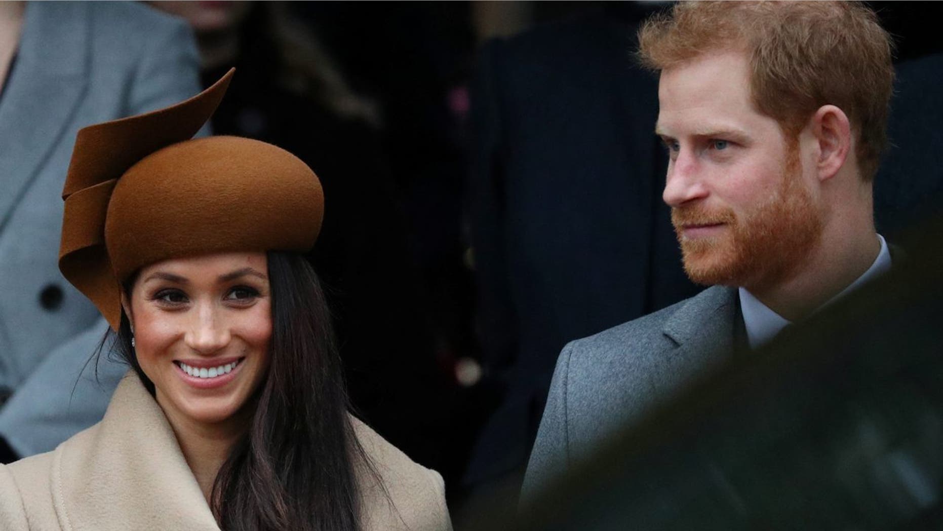 Britain's Prince Harry and his fiancee Meghan Markle leave St Mary Magdalene's church after the Royal Family's Christmas Day service on the Sandringham estate in eastern England, Britain, December 25, 2017. REUTERS/Hannah McKay - RC18CBCBC800