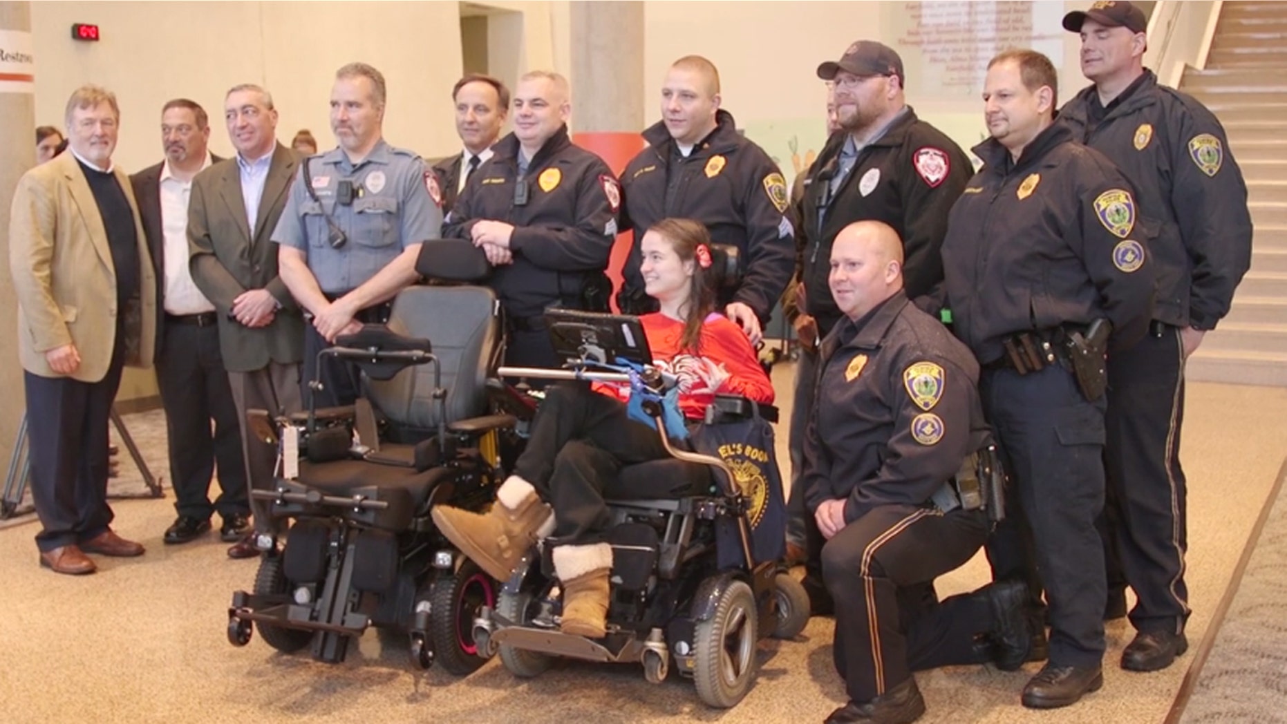 Meg Moore, a sophomore at Fairfield University, was presented with her new high-tech chair last week.