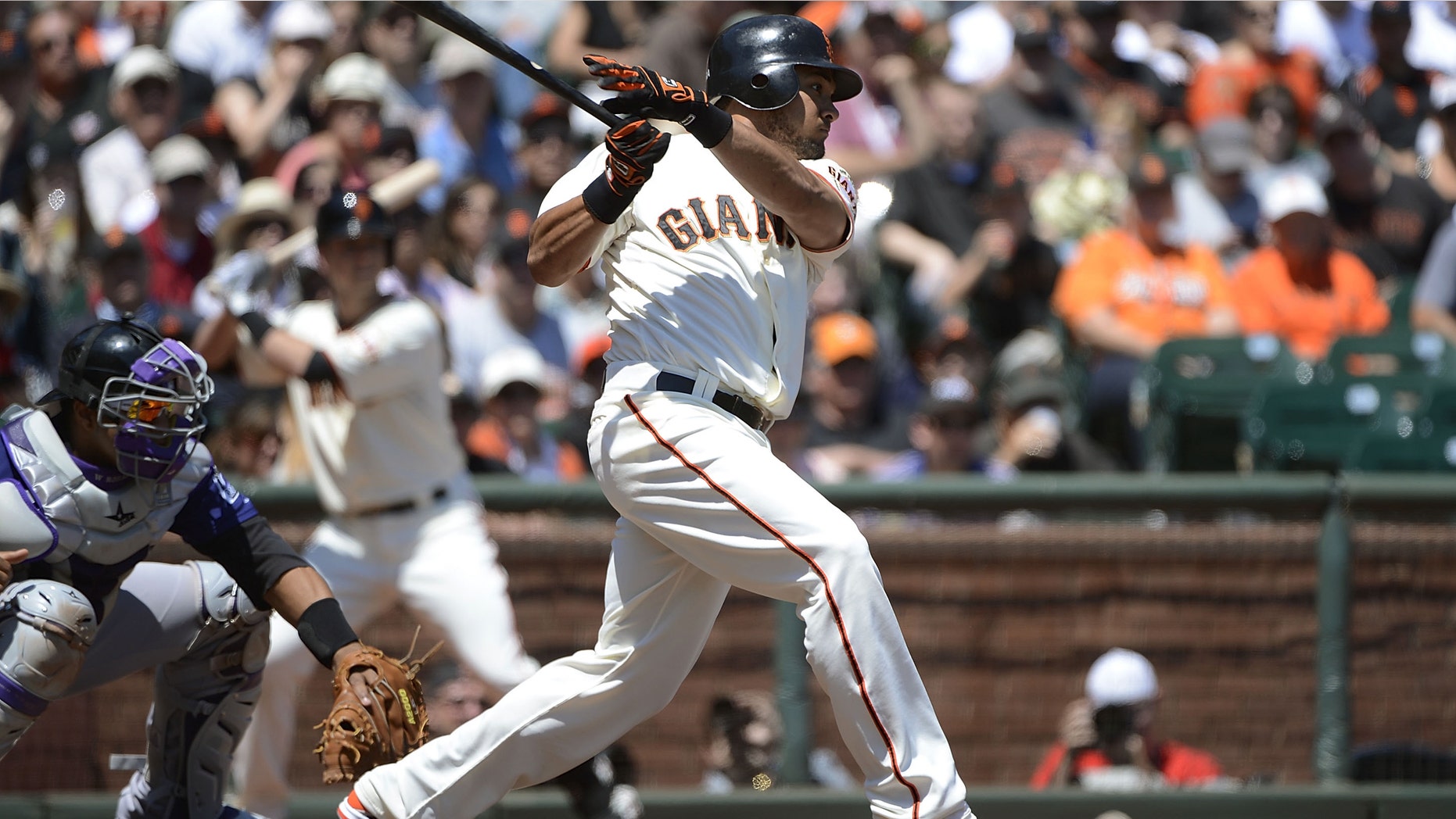 SAN FRANCISCO, CA - AUGUST 12: Melky Cabrera #53 of the San Francisco Giants hits a two-run single driving in Angel Pagan #16 and Marco Scutaro #19 in the first inning against the Colorado Rockies at AT&T Park on August 12, 2012 in San Francisco, California. (Photo by Thearon W. Henderson/Getty Images)