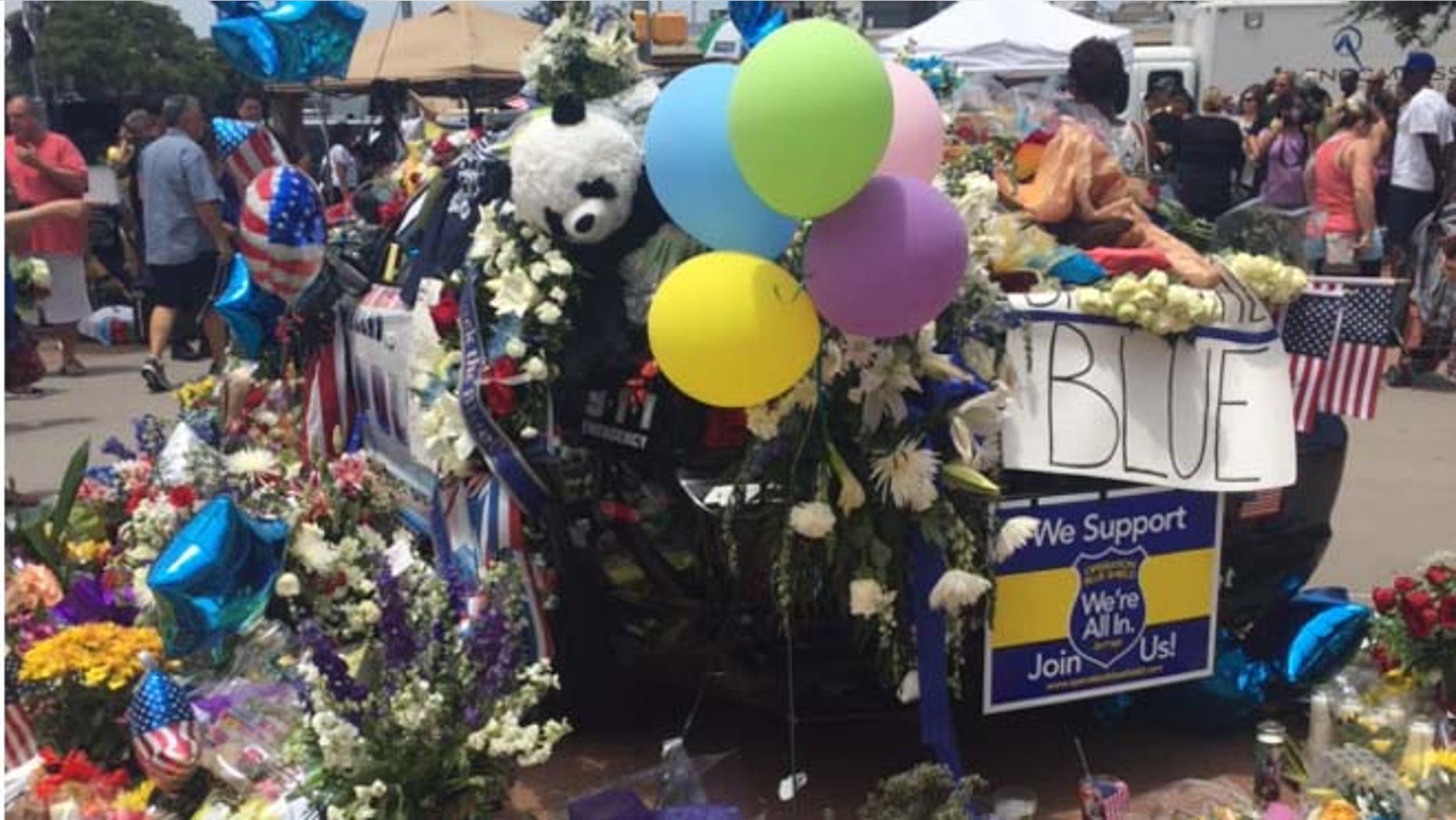 Memorial to five fallen officers outside Dallas Police Headquarters. (Melissa Jacobs)