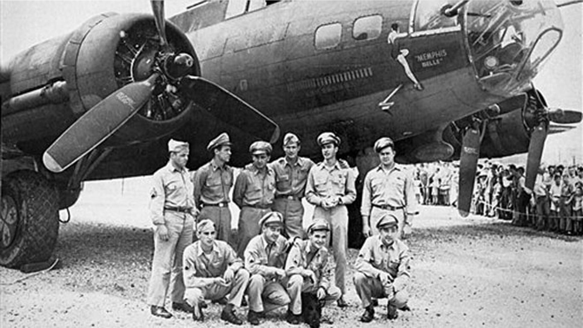 The crew of the Memphis Belle, a Flying Fortress B-17F, poses in front of their plane in Asheville, N.C.