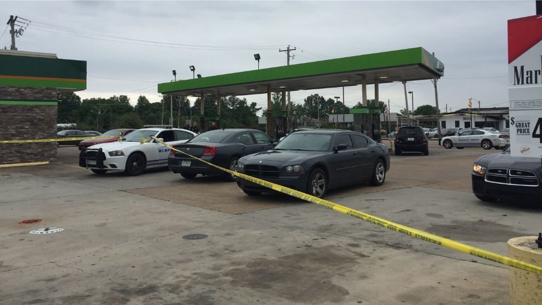 An off-duty police shot at multiple suspects after they robbed him at gunpoint.