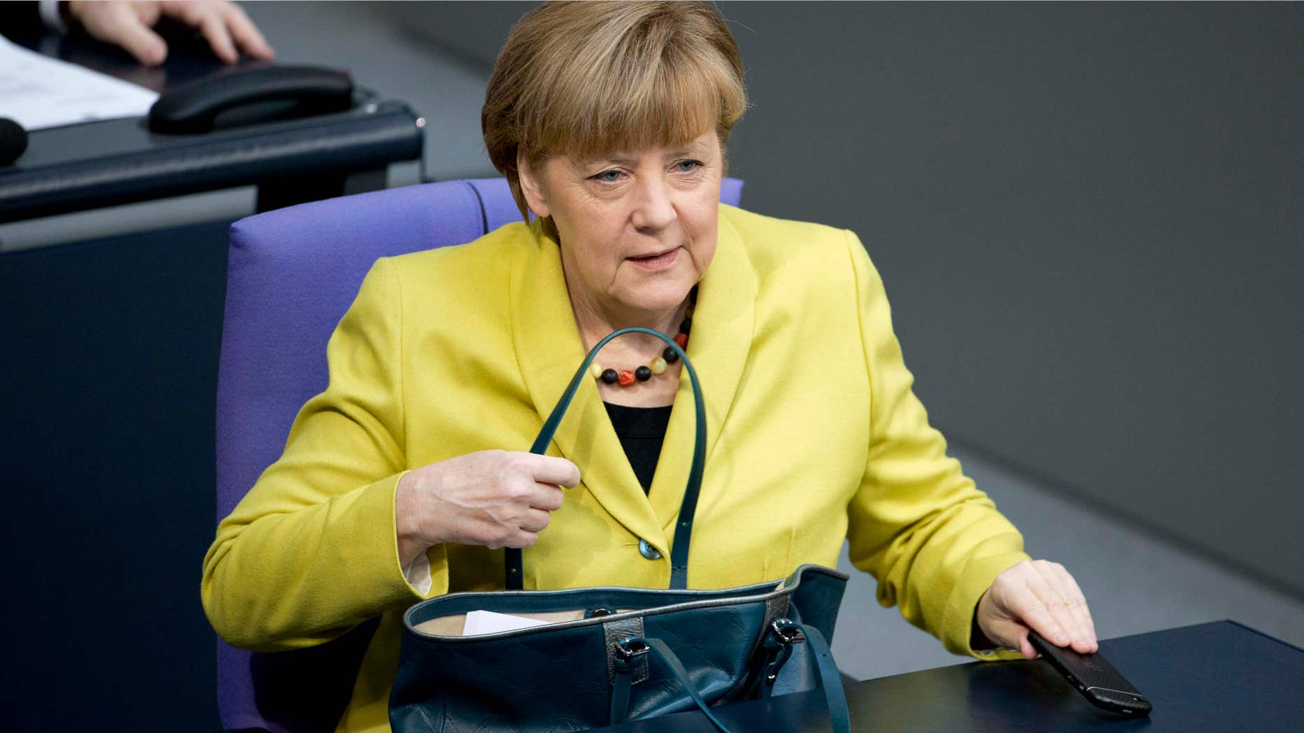 Feb. 27, 2015: German Chancellor Angela Merkel arrives for a debate at the German parliament, the Bundestag in Berlin.