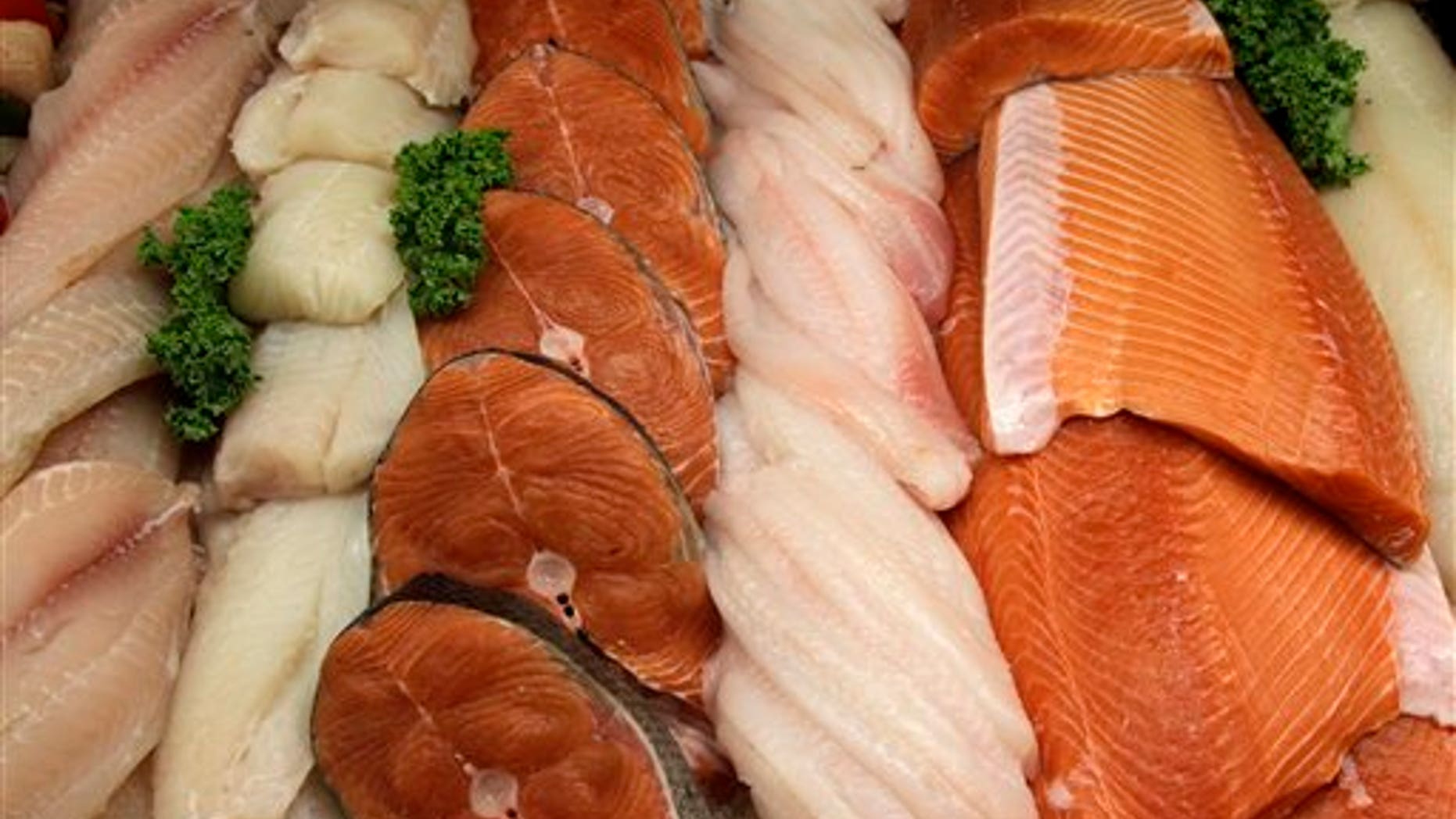 FILE - This Sept. 10, 2010 file photo shows the seafood counter in Whole Foods is shown in Hillsboro, Ore. The government is reminding pregnant women to stay away from certain fish that can be high in mercury. But the agency won't require package labeling on mercury content, which is what consumer groups had sought. The draft advice issued Tuesday by the Food and Drug Administration and the Environmental Protection Agency is unlikely to clear up confusion over exactly what seafood pregnant women and young children should eat and what they should avoid. Consumer groups have sued the agency, saying its warnings haven't been clear enough about what fish could pose a risk. (AP Photo/Rick Bowmer, File)