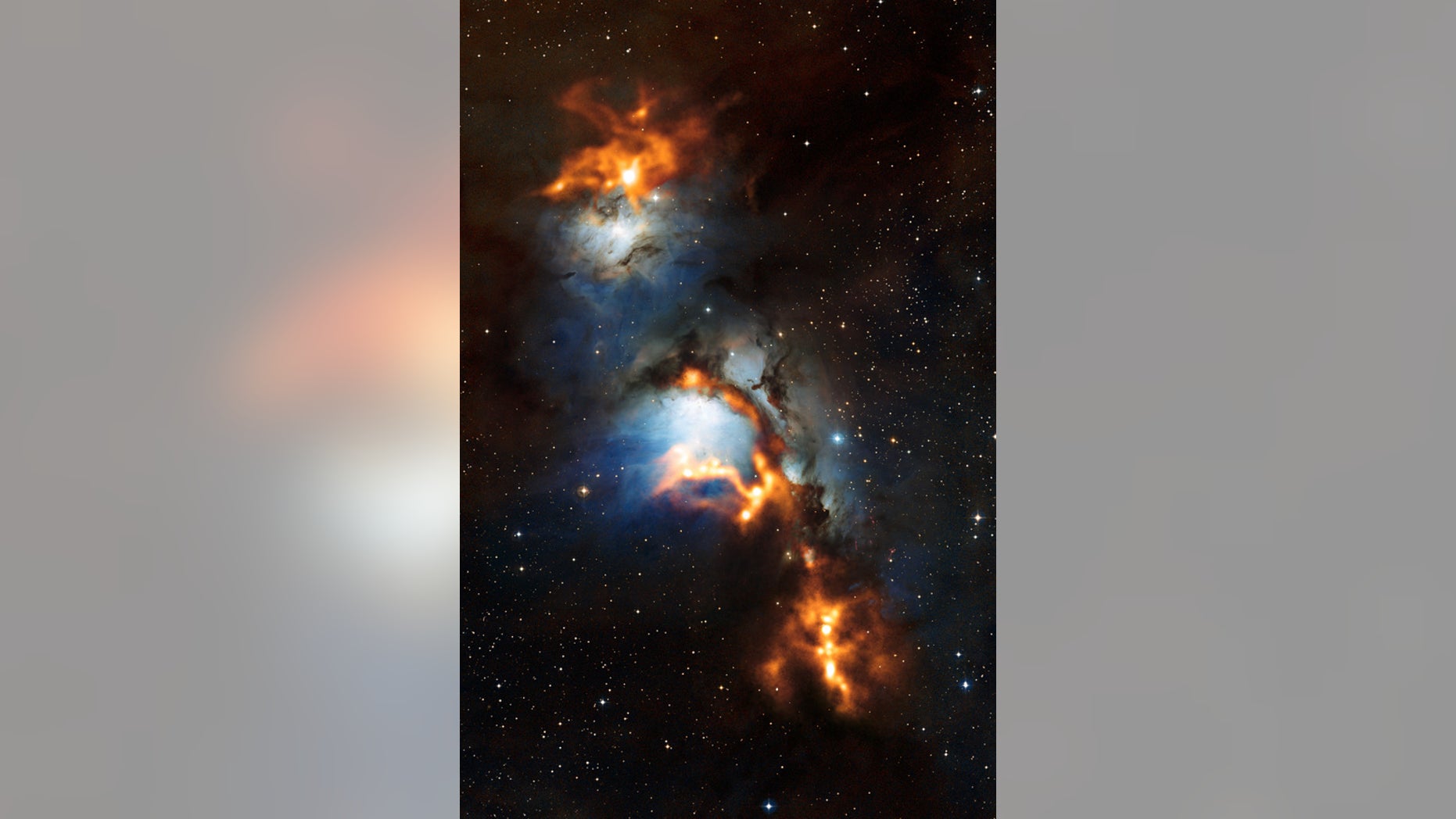 This image of the region surrounding the reflection nebula Messier 78, just to the north of Orion’s belt, shows clouds of cosmic dust threaded through the nebula like a string of pearls. The submillimetre-wavelength observations, made with the Atacama Pathfinder Experiment (APEX) telescope and shown here in orange, use the heat glow of interstellar dust grains to show astronomers where new stars are being formed. They are overlaid on a view of the region in visible light.