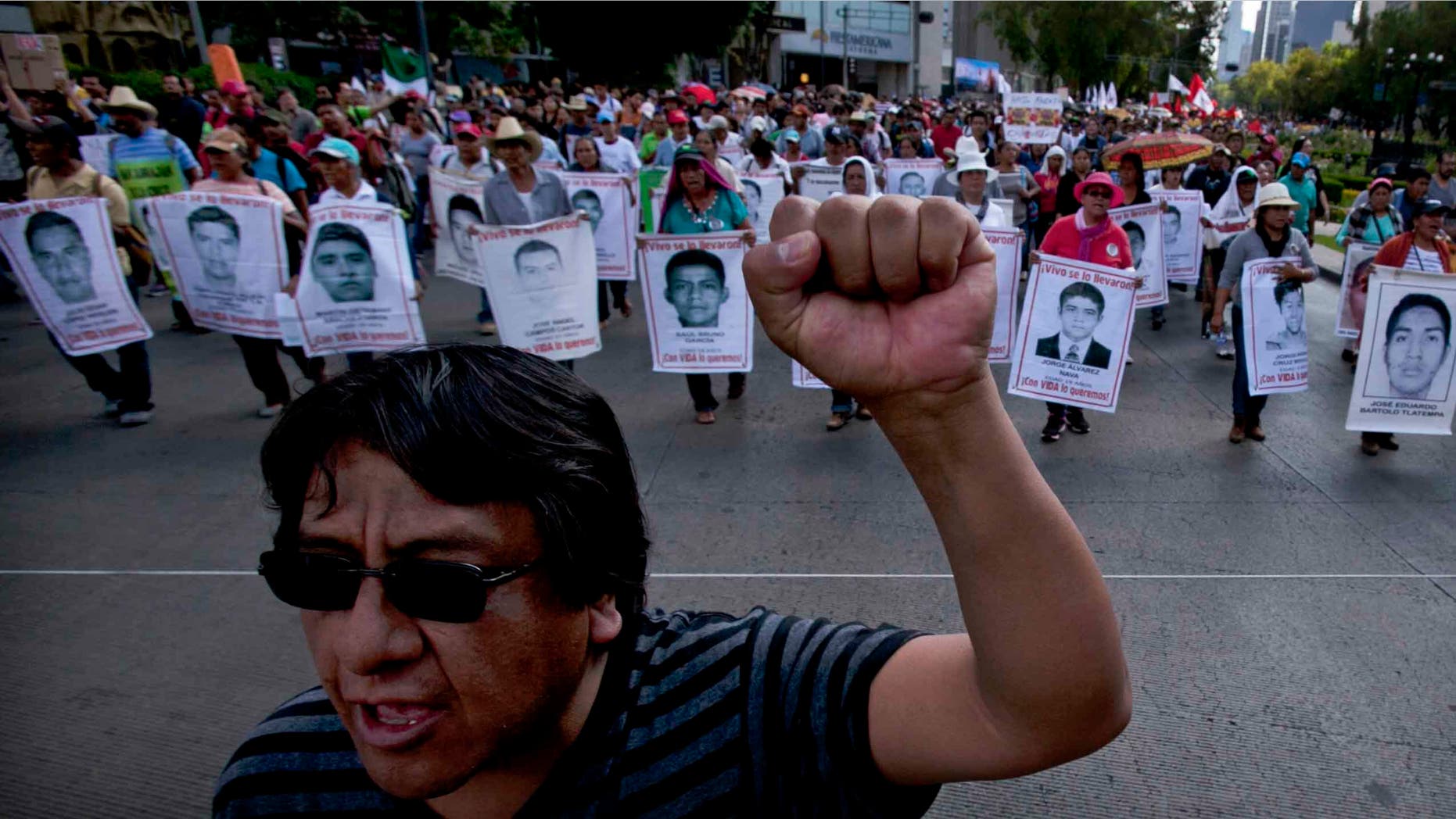 Relatives of the 43 missing students during a protest in Mexico City, Sunday, July 26, 2015.