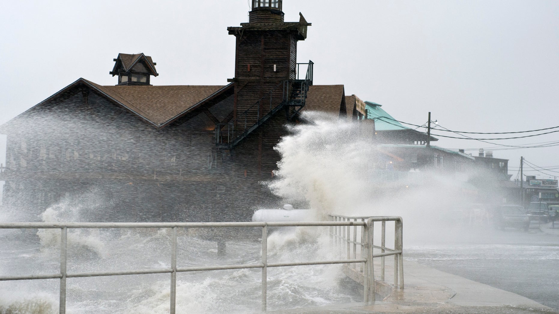 High winds, high tide strike at the main street of Cedar Key, Fla., as Tropical Storm Debby makes it's way across the Gulf of Mexico
