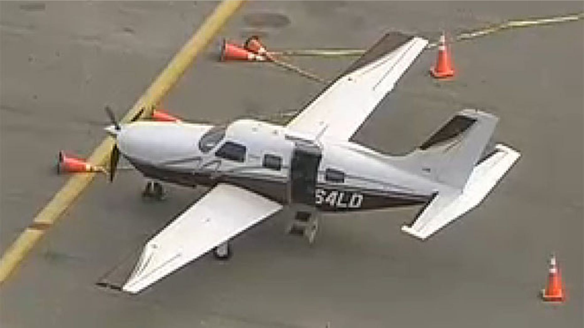 Nov. 14, 2013: A passenger fell out of this Piper PA 46 aircraft, which is shown at the Kendall-Tamiami Executive Airport in Miami.
