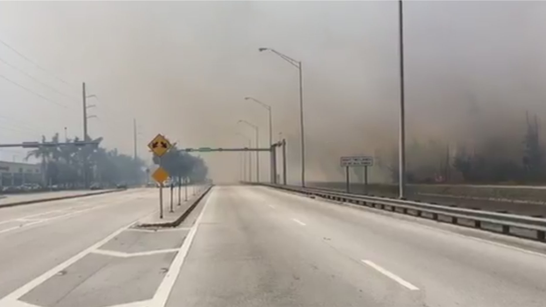 Haze from a fire Sunday in Miami-Dade County, Florida.