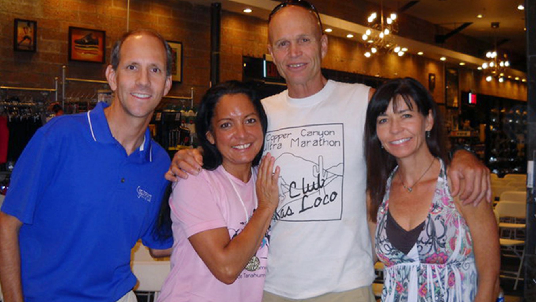 FILE June 2010: Micah True, center in the white shirt, had cardiomyopathy, a disease that results in the heart becoming enlarged.