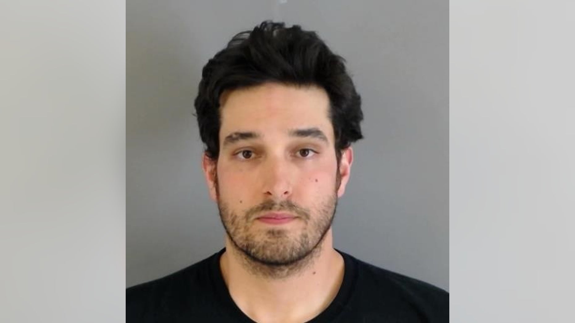Michael Kourosh Sadeghi was arrested for "investigation of first-degree murder," police said.