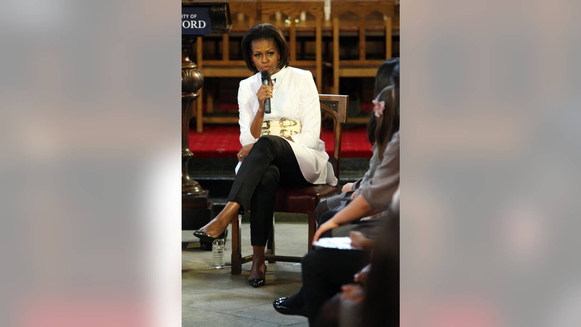 US First Lady Michelle Obama answers questions during a Q&A session at Christ Church college at Oxford University Wednesday May 25, 2011. (Steve Parsons/PA Wire, Press Association via AP Images)