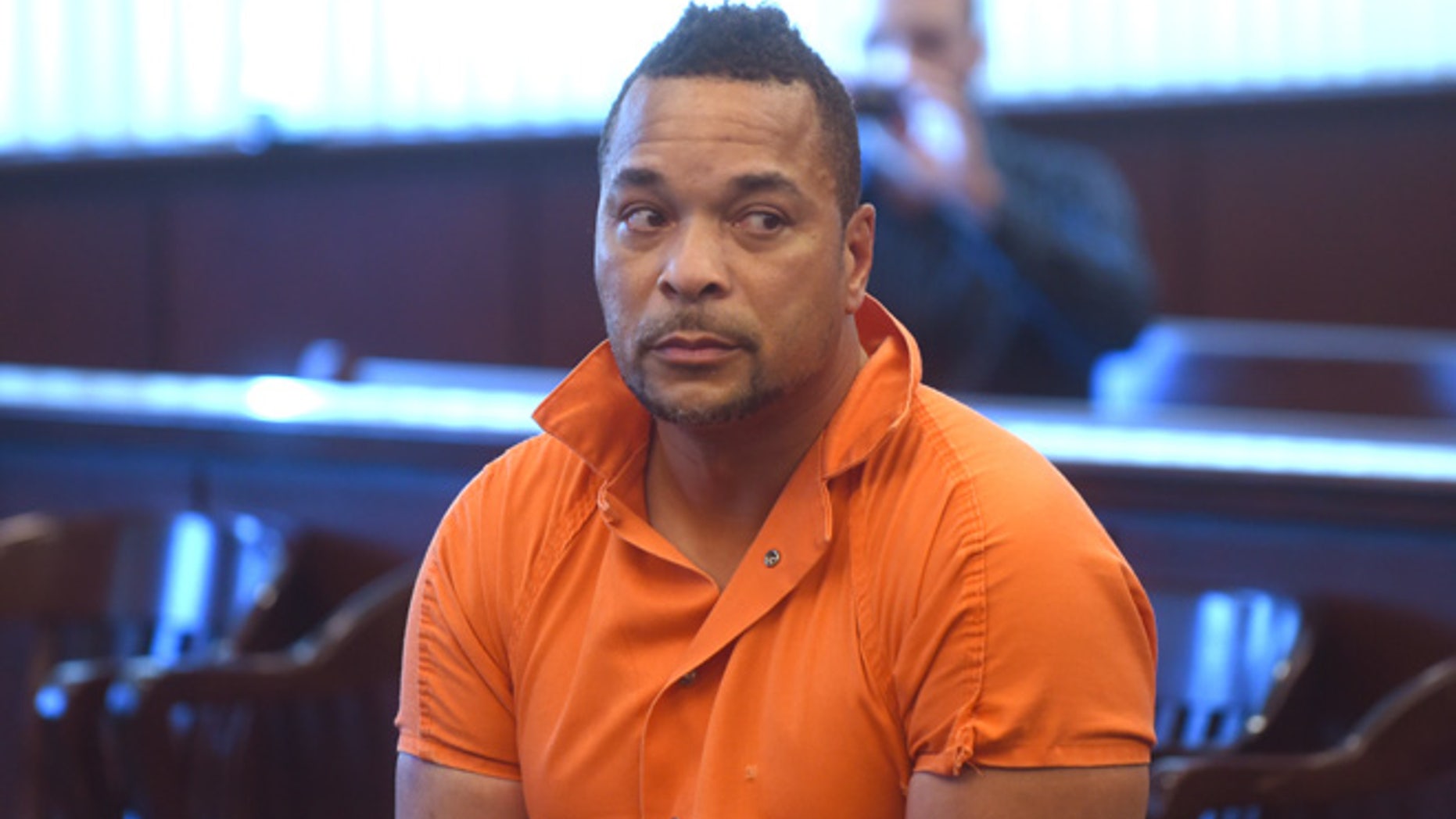 Gregory Green is arraigned in 20th District Court in Dearborn Heights, Mich., on Thursday Sept. 22, 2016. Green is suspected of killing two young children and two teenagers and critically injured his wife at his at his Detroit-area home. (Max Ortiz/The Detroit News via AP)