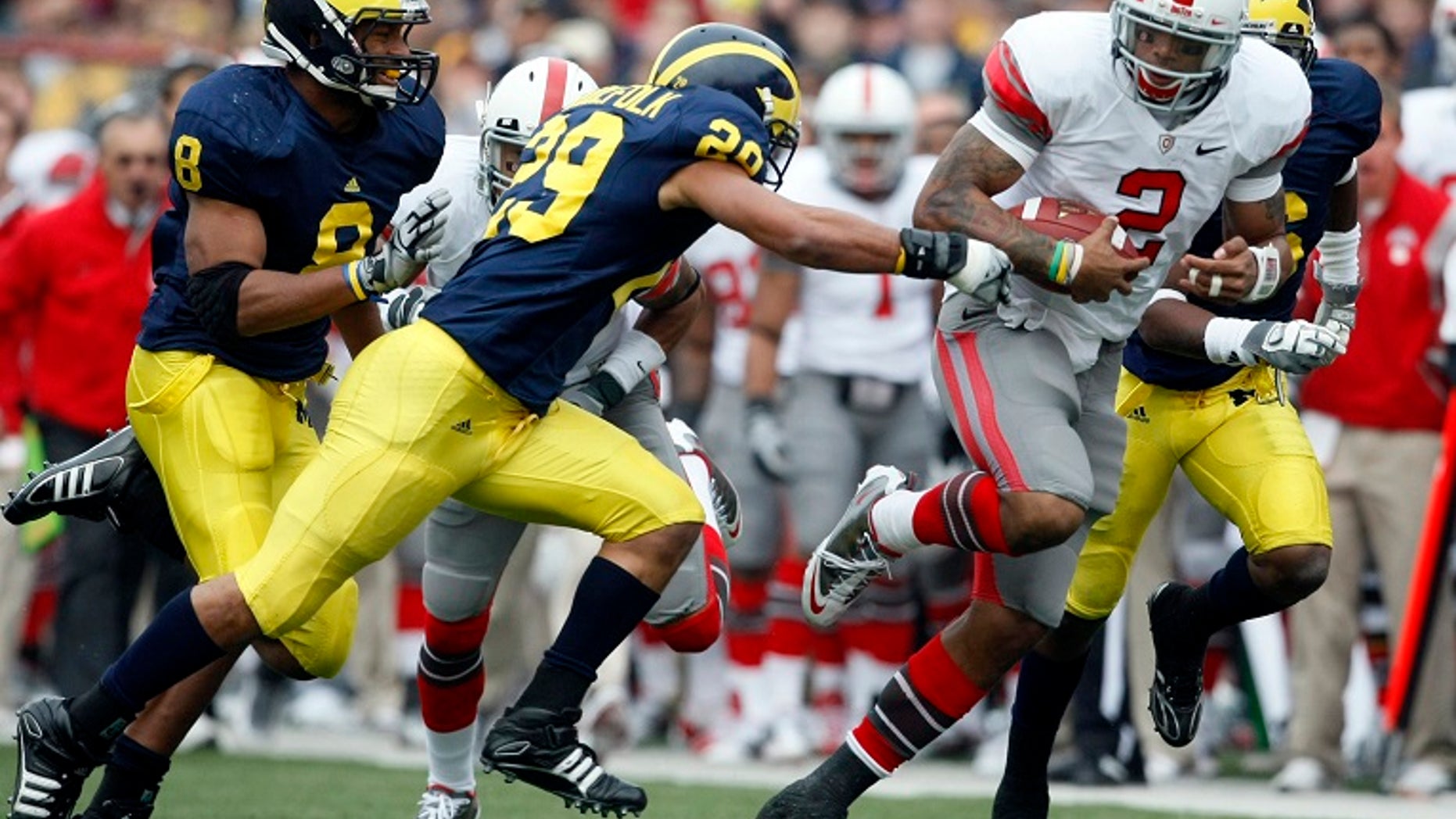 An Ohio man who was severely injured in a car accident in March in Europe is making progress after he was he answered no to liking University of Michigan football team, the Wolverines.