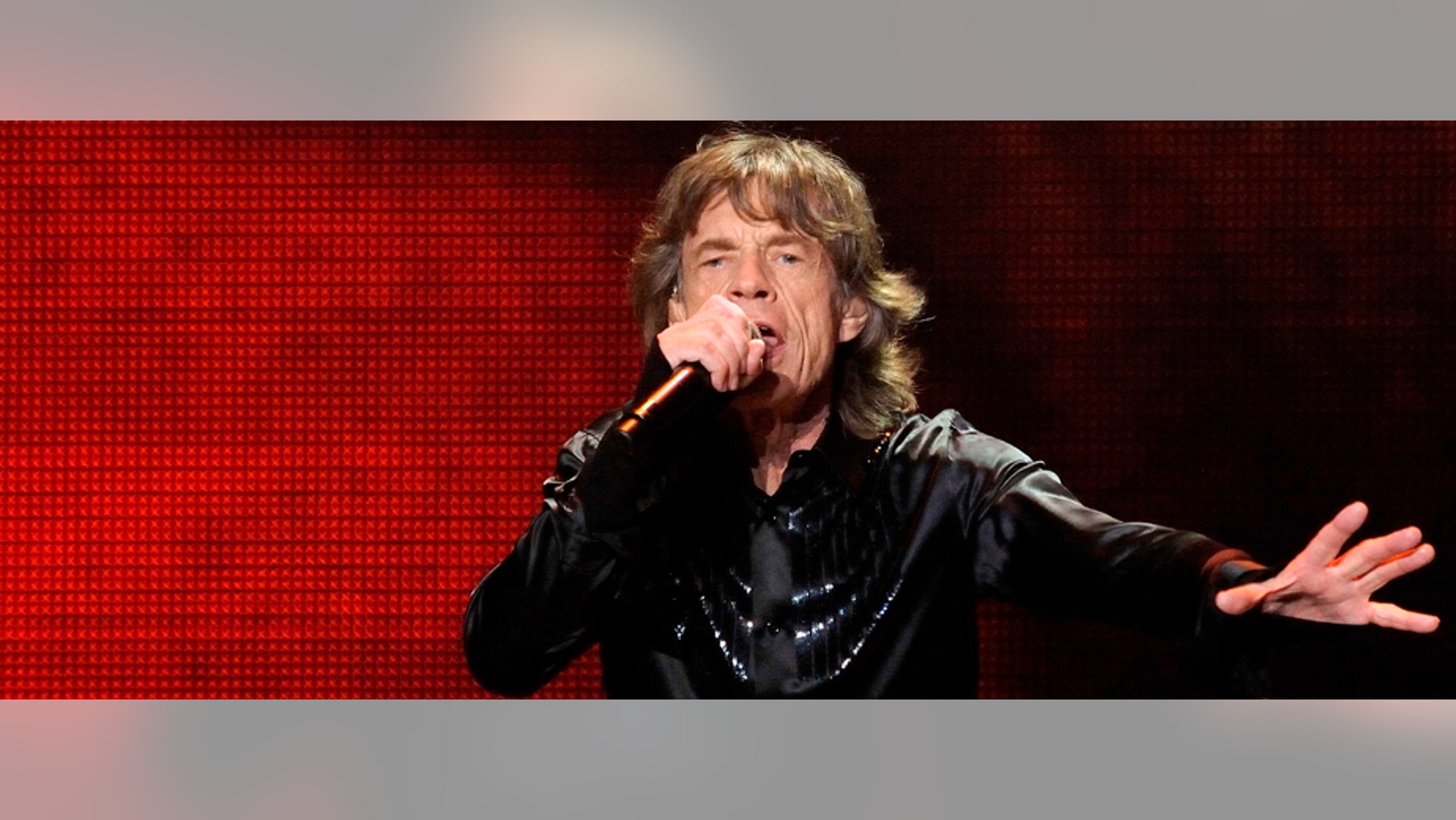 FILE -- March 12, 2014: Mick Jagger of the Rolling Stones performs during a concert in Shanghai, China.