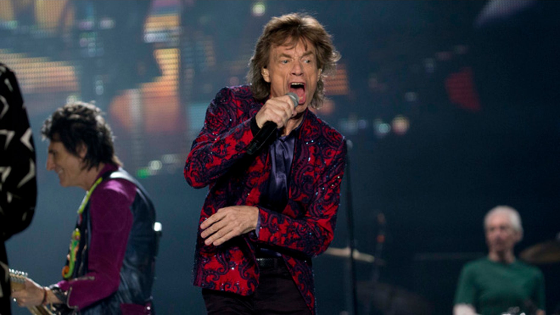 The Rolling Stones' Mick Jagger performs during the band's Ole Tour at Foro Sol in Mexico City, Monday, March 14, 2016. (AP Photo/Eduardo Verdugo)