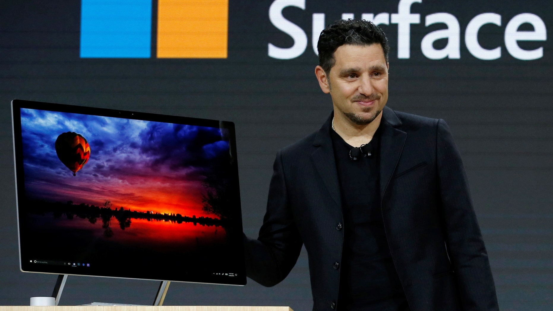 Panos Panay, Corporate Vice President for Surface Computing demonstrates the new Microsoft Surface Studio computer at a live event in the Manhattan borough of New York City, Oct. 26, 2016. (REUTERS/Lucas Jackson)