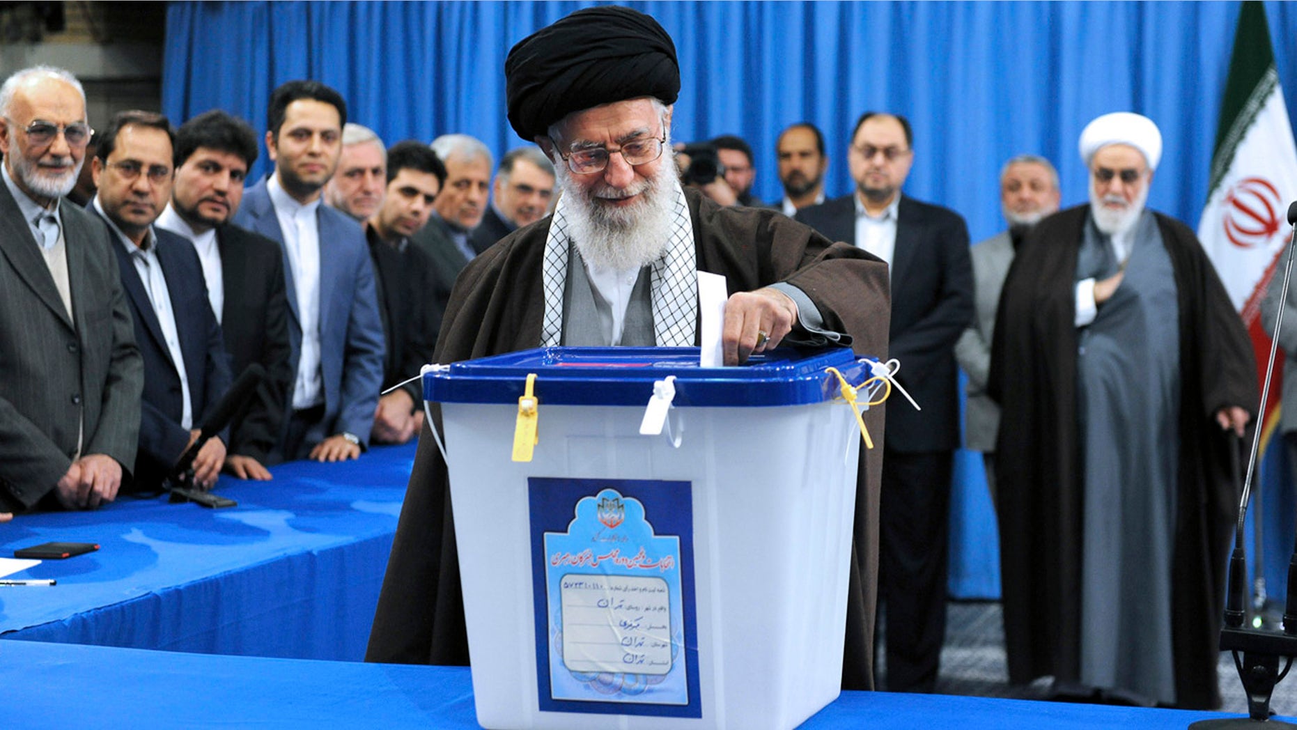 FILE -- Feb. 26, 2016: In this photo released by official website of the office of the Iranian supreme leader, Supreme Leader Ayatollah Ali Khamenei casts his ballot during parliamentary and Experts Assembly elections in Tehran, Iran. (Office of the Iranian Supreme Leader via AP)