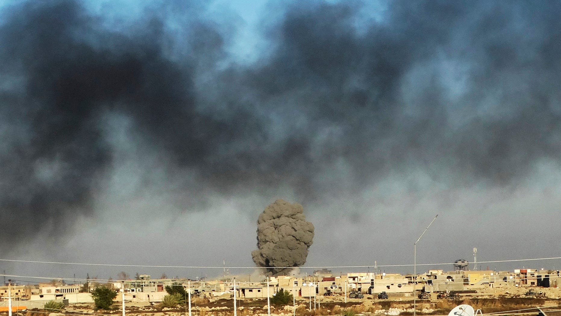 FILE: Dec. 25, 2015: Smoke from Islamic State positions following a U.S.-led coalition airstrike as Iraqi Security forces advance their position in downtown Ramadi, 70 miles west of Baghdad, Iraq. (AP)