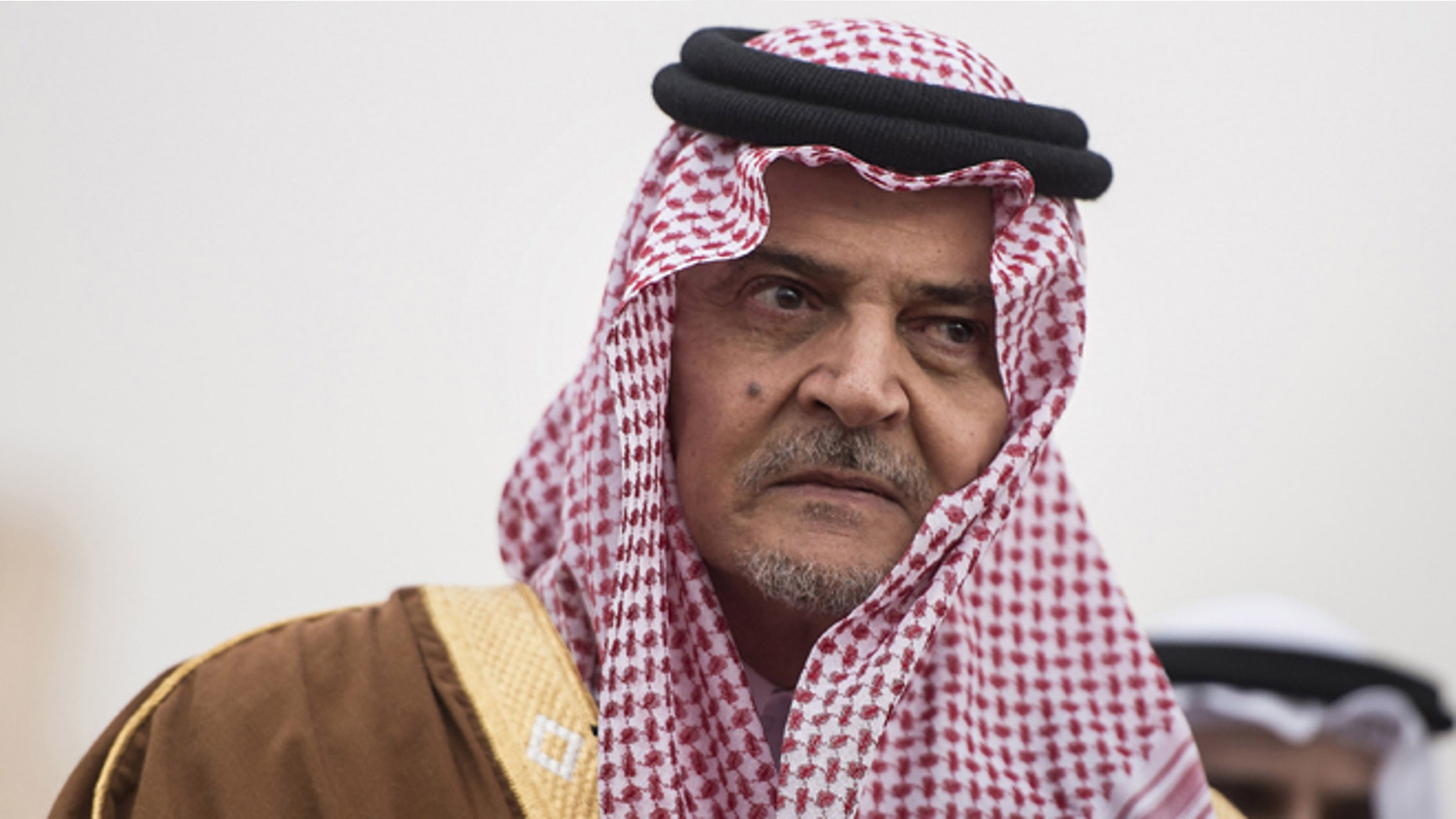 Jan. 5, 2014: Saudi Foreign Minister Prince Saud al-Faisal waits to greet U.S. Secretary of State John Kerry as Kerry arrives at King Khalid International Airport in Riyadh, Saudi Arabia.