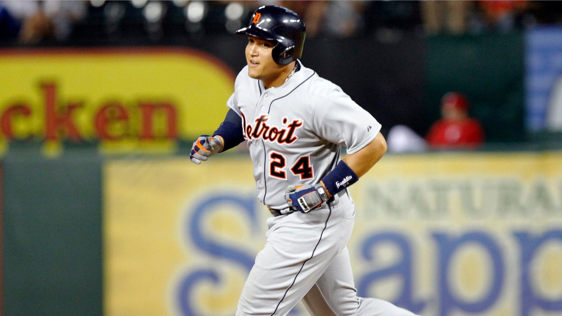 Detroit Tigers Miguel Cabrera rounds the bases after hitting his second home run of the game against the Texas Rangers Sunday, May 19, 2013.