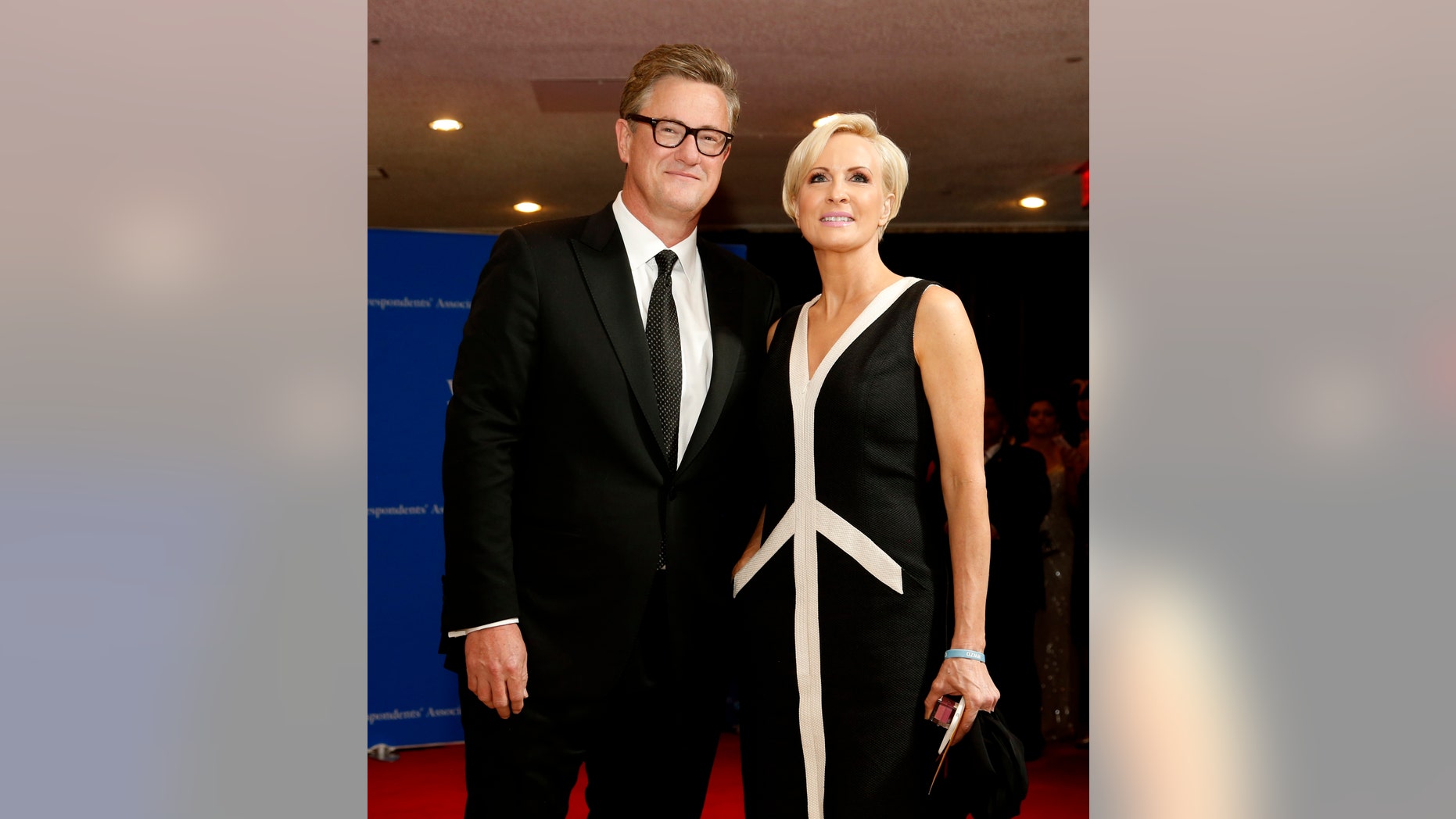 MSNBC's Joe Scarborough and Mika Brzezinski arrive for the annual White House Correspondents' Association dinner in Washington April 25, 2015. REUTERS/Jonathan Ernst - RTX1A9XH