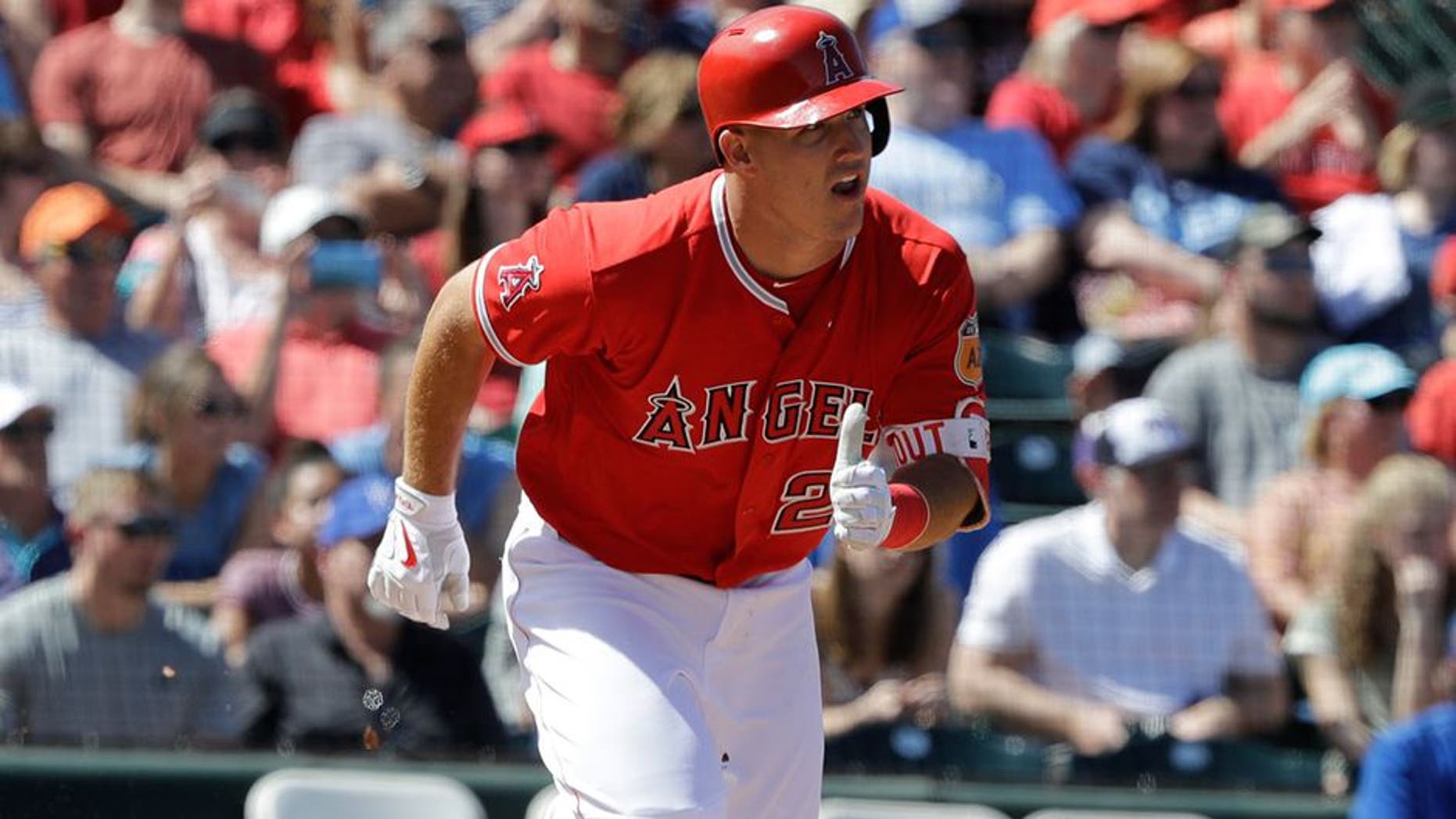 Los Angeles Angels' Mike Trout hits during a spring training baseball game against the Kansas City Royals, Sunday, March 26, 2017, in Tempe, Ariz. (AP Photo/Darron Cummings)