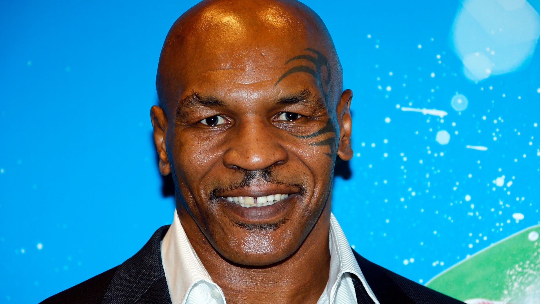 October 8, 2014. Former professional boxer Mike Tyson poses before receiving the Sportel Special Prize Autobiography for his book "Undisputed Truth: My Autobiography" during the Golden Podium Awards at the Sportel in Monte Carlo.