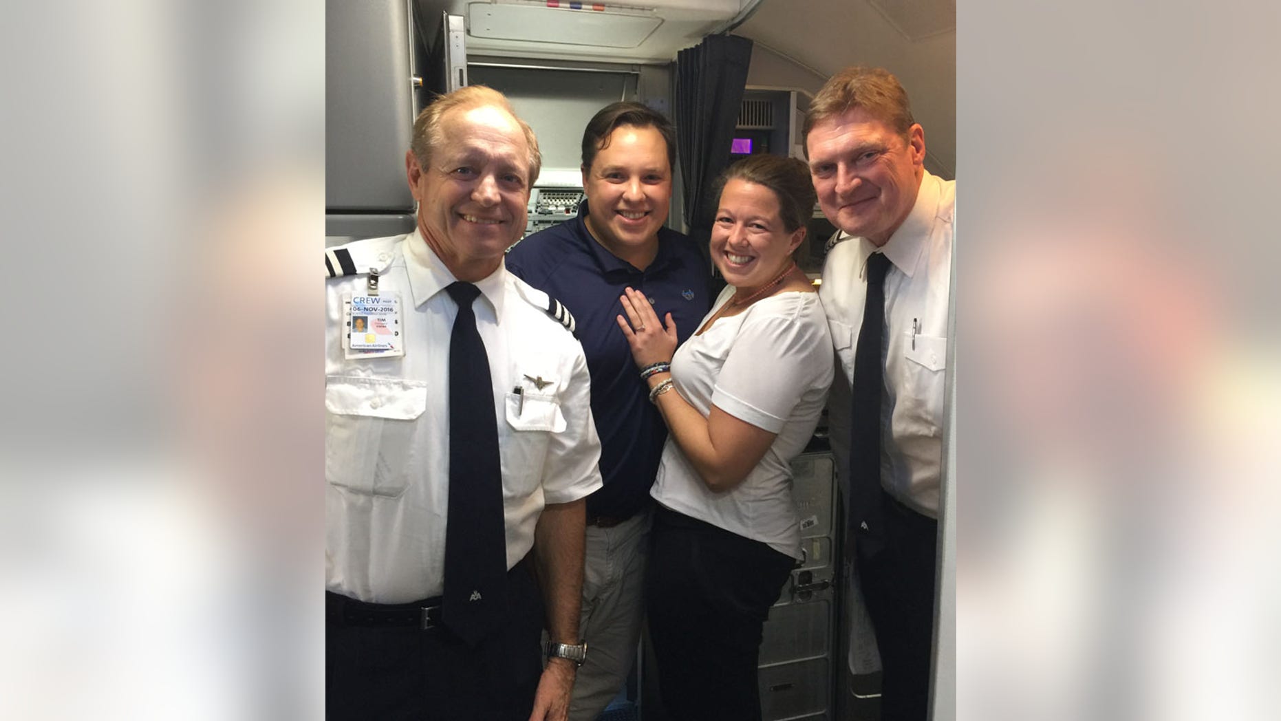 Rebecca Eltzroth and Sam Lockard with the American Airlines captain and co-pilot. The picture was taken after the plane had landed.