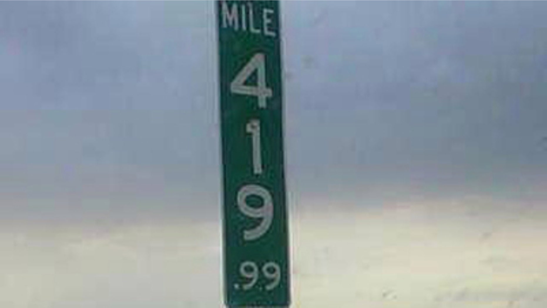 This undated photo shows the new 419.99 mile marker that replaces the 420 mile marker after multiple thefts.
