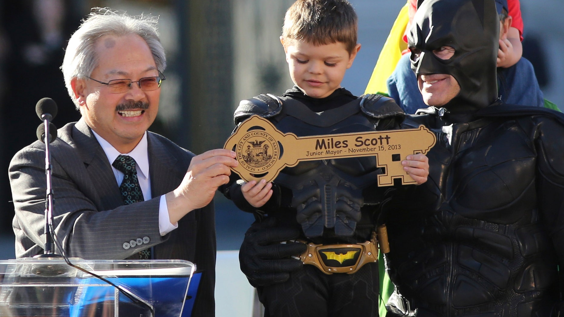 Nov. 15, 2013: Five-year-old leukemia survivor Miles Scott, dressed as Batkid, receives a key to the city declaring him Junior Mayor from San Francisco from Mayor Ed Lee, left, during a ceremony as part of a day arranged by the Make-A-Wish Foundation in San Francisco, Calif.