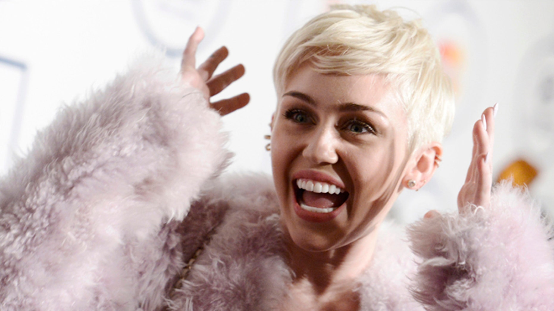 Jan. 25, 2014: Miley Cyrus arrives at the 56th annual Grammy awards.