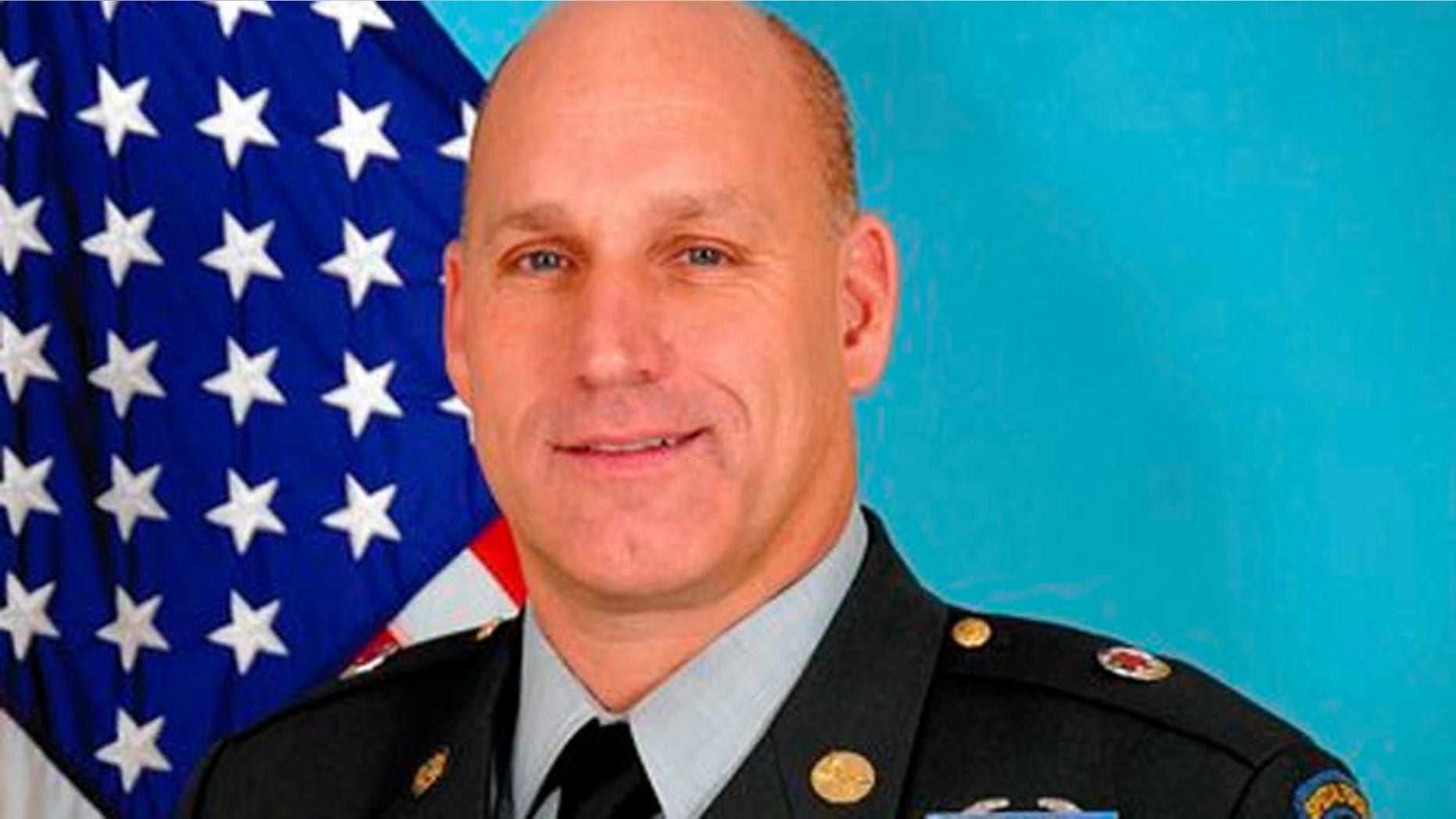 Sgt. Maj. Richard Erickson, 50, says he was fired from the U.S. Postal Service for taking too much time to serve his country.