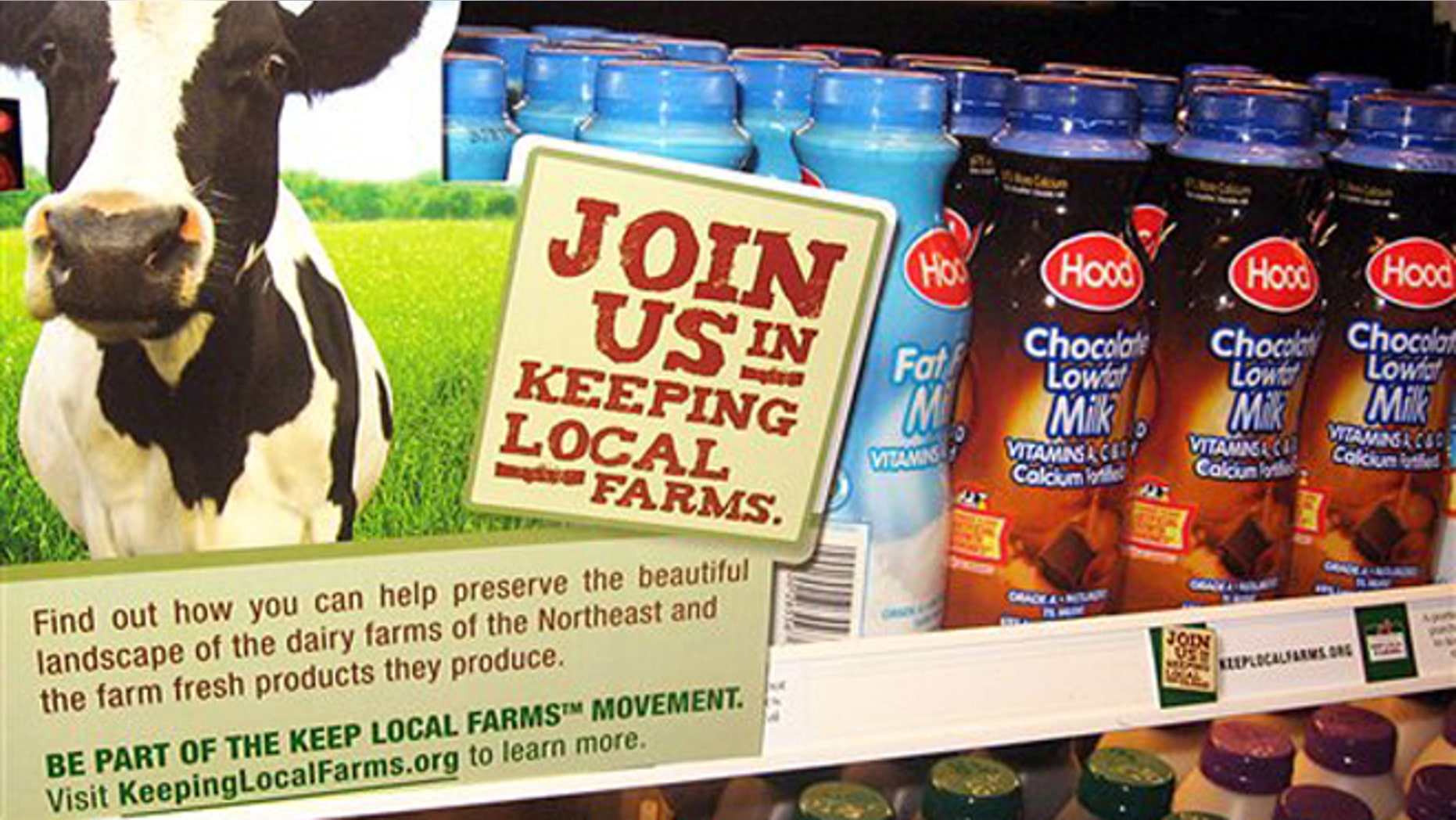 Dec. 17, 2009: Milk is displayed with a Keep Local Farms sign in Burlington, Vt.