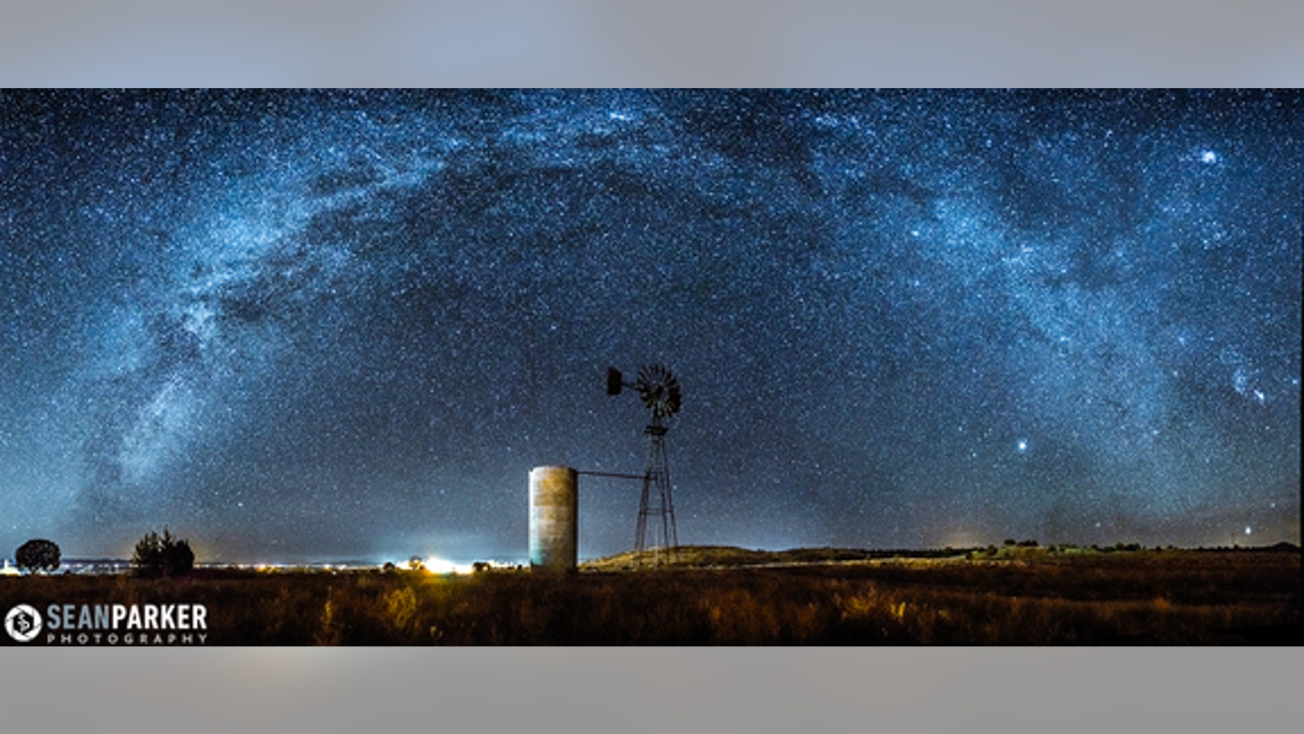 The Milky Way arches over an old windmill near Paulden, Arizona. Astrophotographer Sean Parker sent this image to SAPCE.com on Dec. 30, 2013.