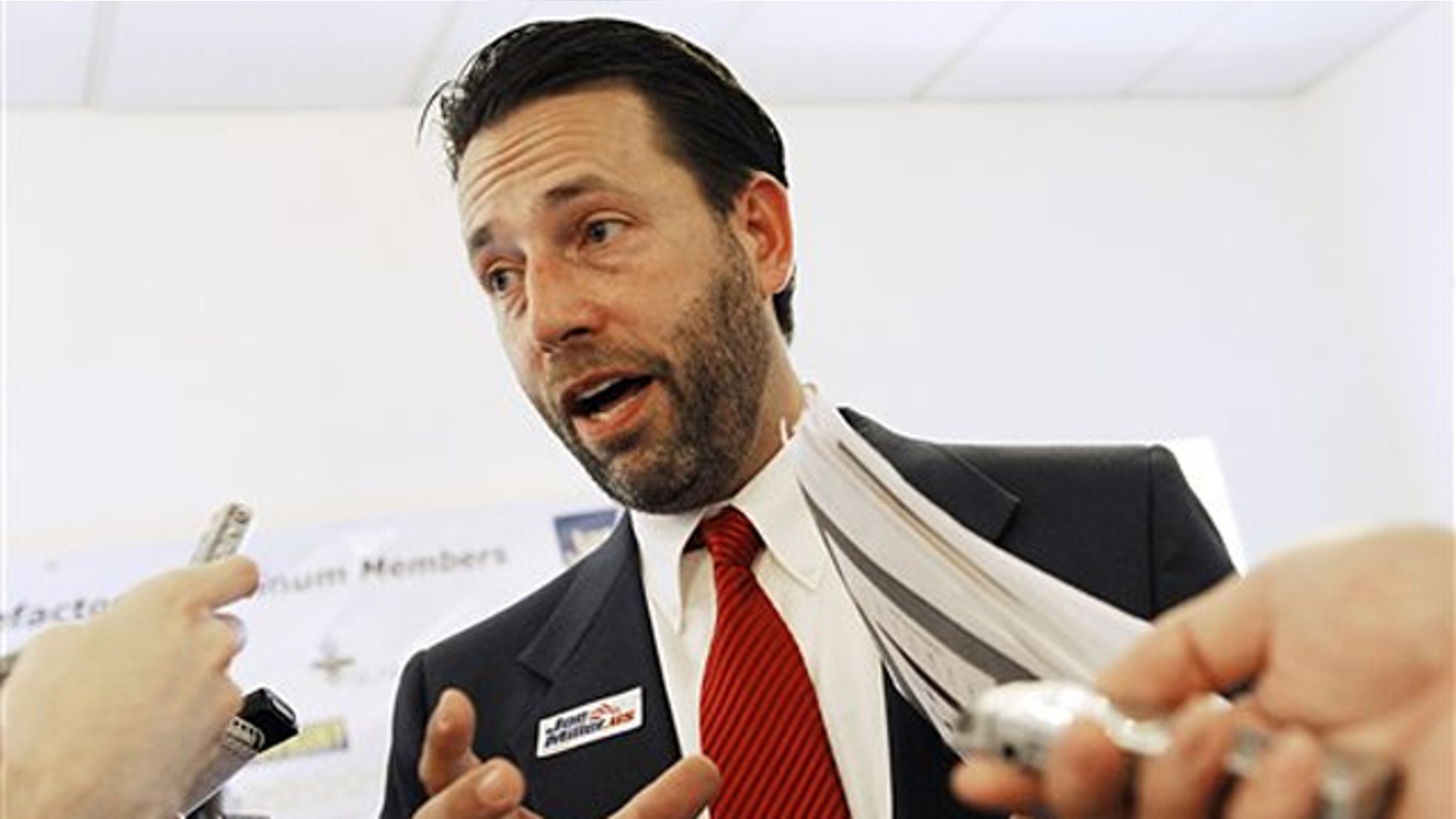 In this Sept. 16 photo, Republican Senate candidate Joe Miller answers questions from the media in Juneau, Alaska. (AP Photo)