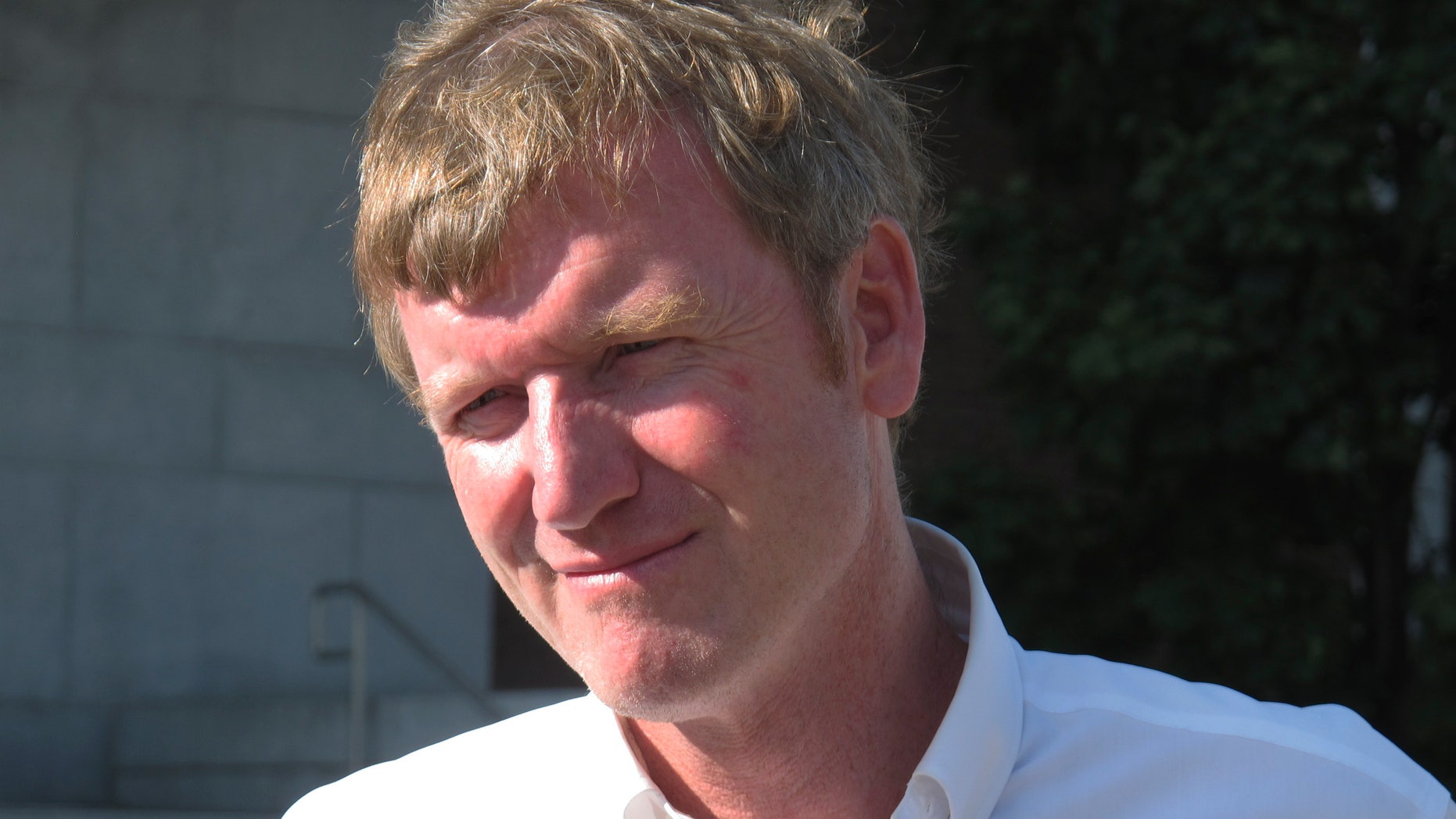 Aug. 26, 2014: Republican gubernatorial hopeful Scott Milne stands outside a polling place on primary election day.