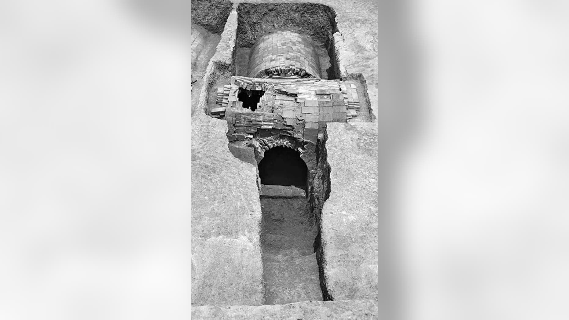 A brick tomb from the Ming Dynasty held gold treasures and the skeletal remains of a woman named Lady Mei. The tomb, with its vaulted roof, was excavated in 2008.