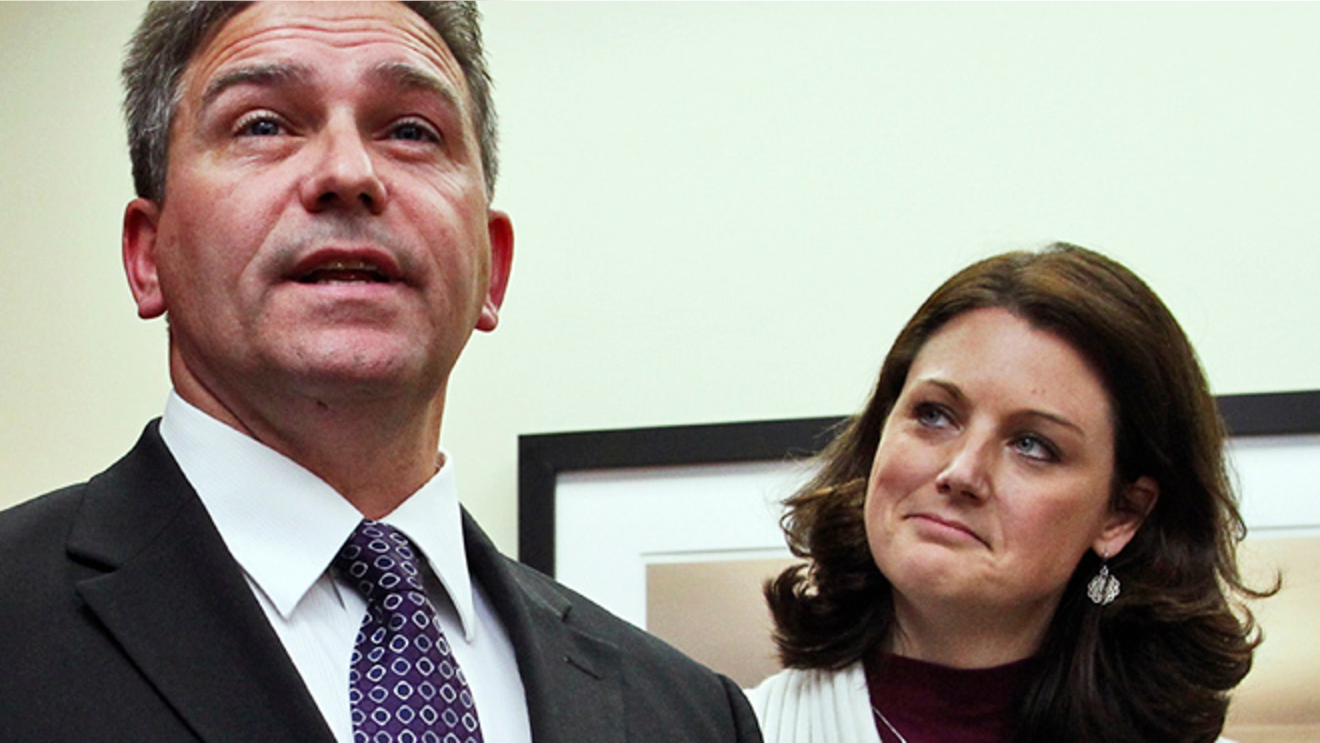 Nov. 30, 2012: In this file photo, Todd Hoffner talks with reporters with his wife, Melodee, in Mankato, Minn., after a judge dismissed child pornography charges against him.