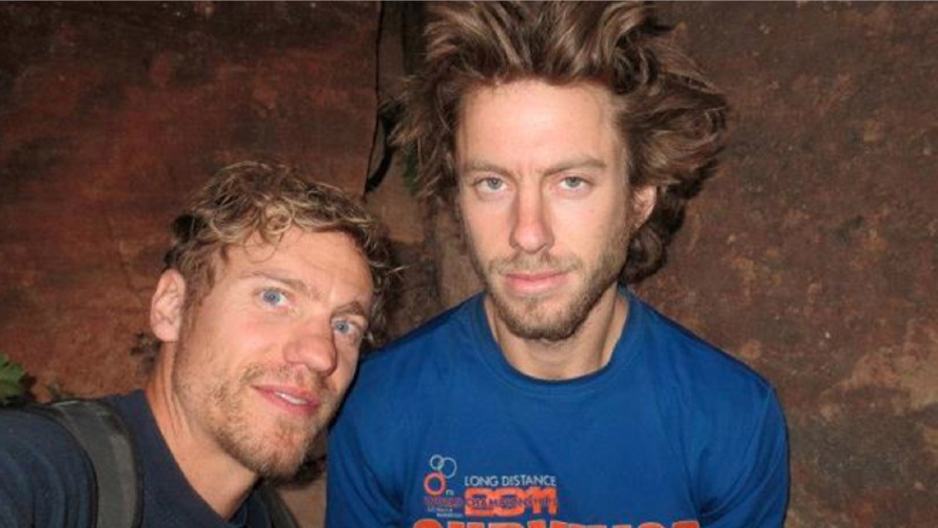 July 2012: This photo provided by Galit Weiss, climber Gil Weiss, right, and Ben Horne pose for a photo as they climb the Palcaraju Peak in Peru.